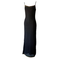 Christian Dior par John Galliano, collection automne-hiver 2001 : robe de soirée longue noire ornée de perles