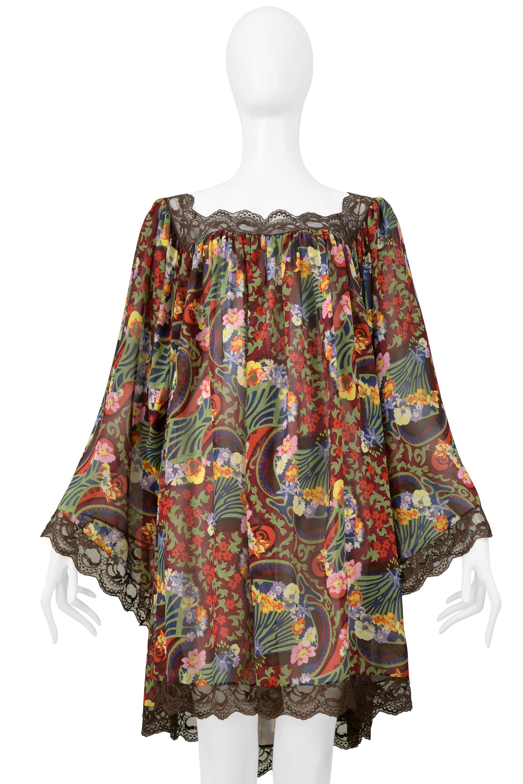 Resurrection is excited to offer a vintage Christian Dior by John Galliano fan print silk and lace dress featuring intricate lace detailing around the neckline, sleeves, and hem, sheer silk fabric, and above-the-knee length. This dress has never
