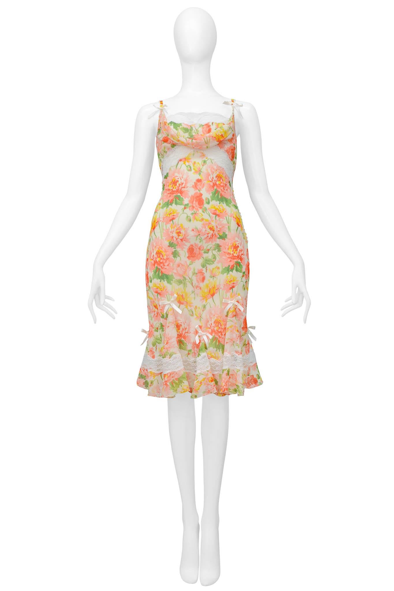 Resurrection Vintage is excited to offer a vintage Christian Dior silk floral dress featuring white lace, inset ruffles along the hem, satin bows, and an attached off-white slip dress under the dress.

Christian Dior
Designed by John Galliano
By