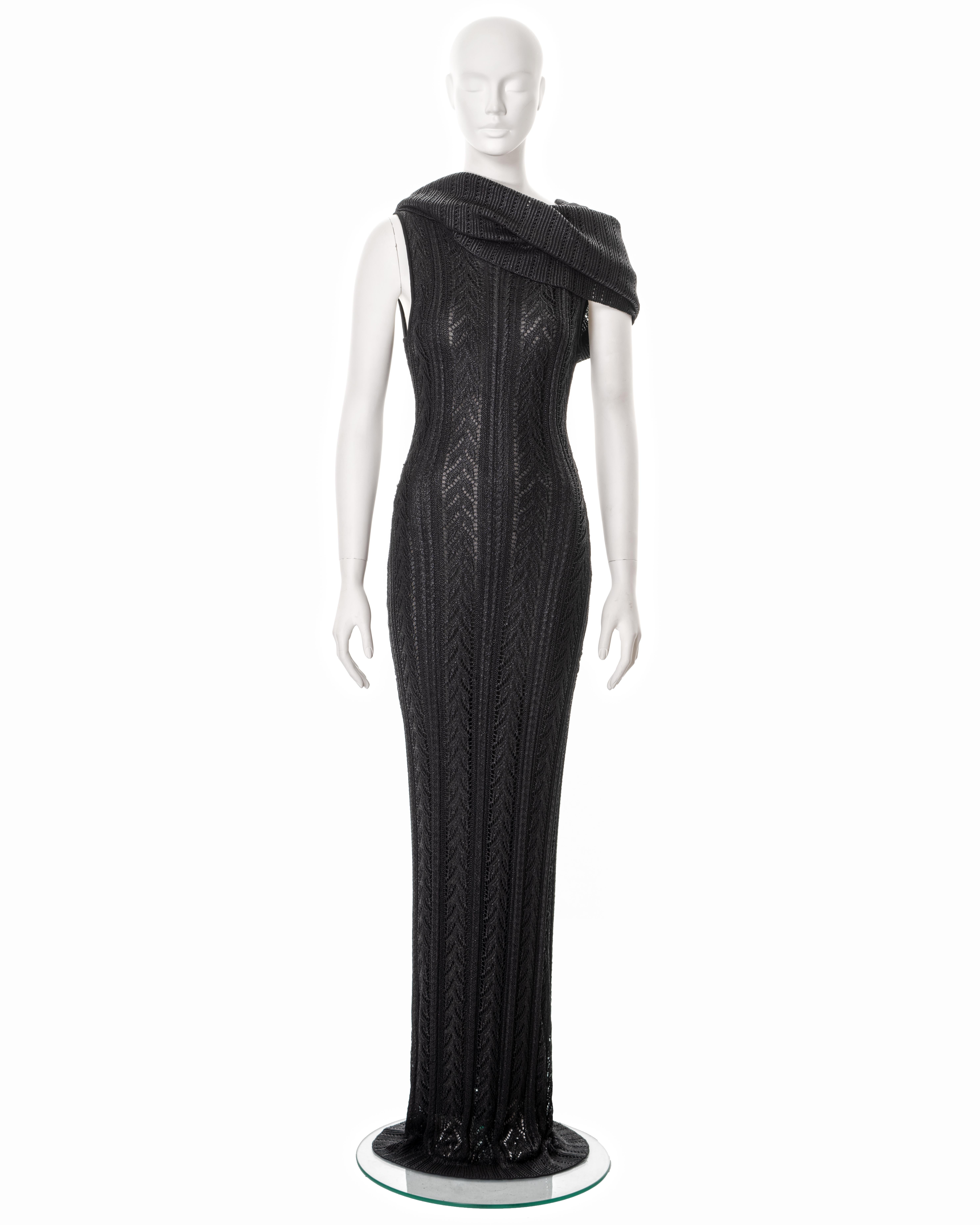 ▪ Christian Dior evening dress
▪ Creative Director: John Galliano
▪ Constructed from black foiled open-knit viscose 
▪ Large turn-over collar which can be draped in multiple ways 
▪ Bodycon fit 
▪ Built-in lining 
▪ Floor-length skirt 
▪ Size FR 40