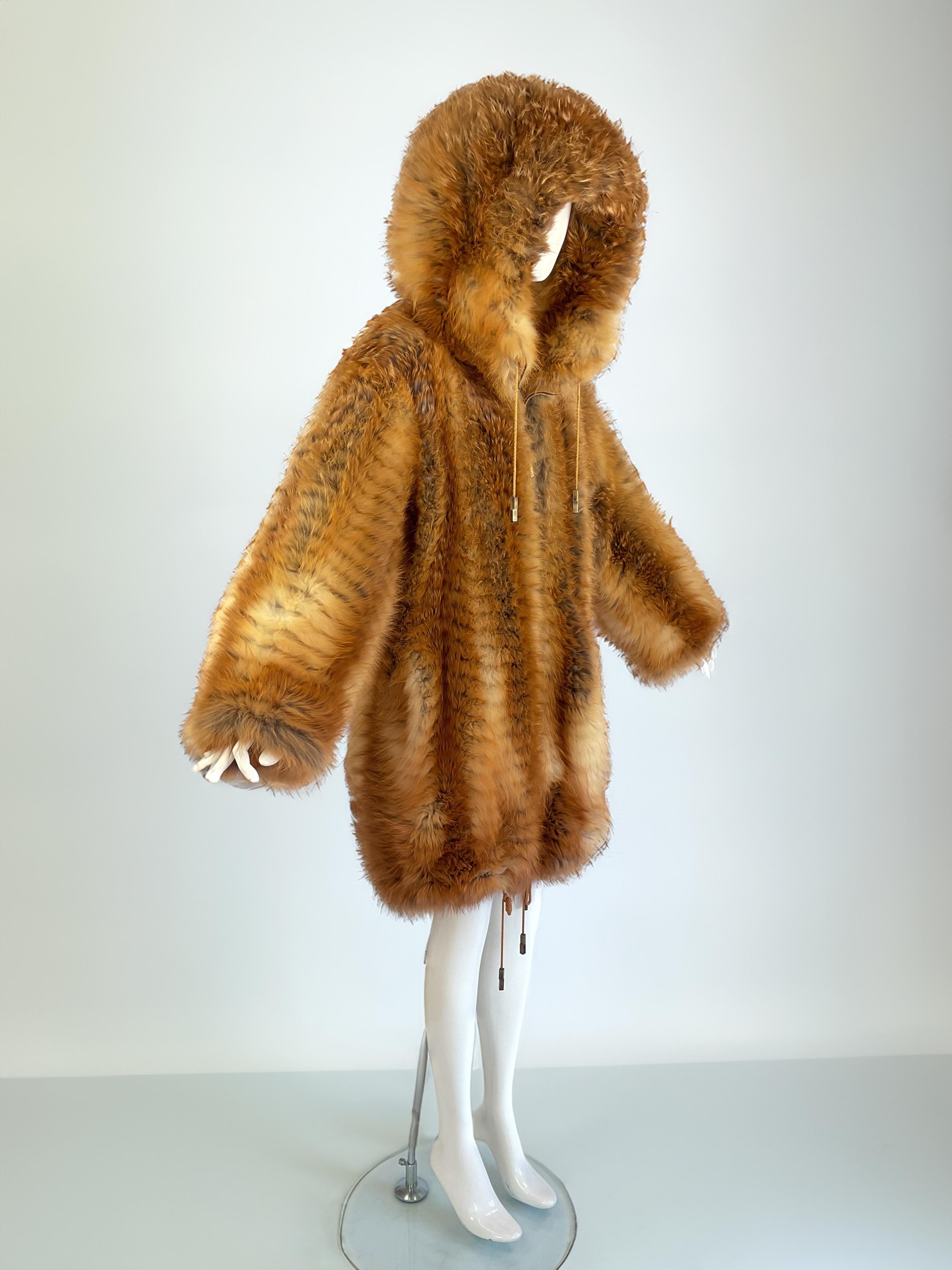 Extremely rare and spectacular Christian Dior Boutique fox fur coat, custom-made for a discerning couture collector by Dior under John Galliano’s direction for the Fall-Winter 2003 season.

This remarkable piece is directly inspired by the oversized