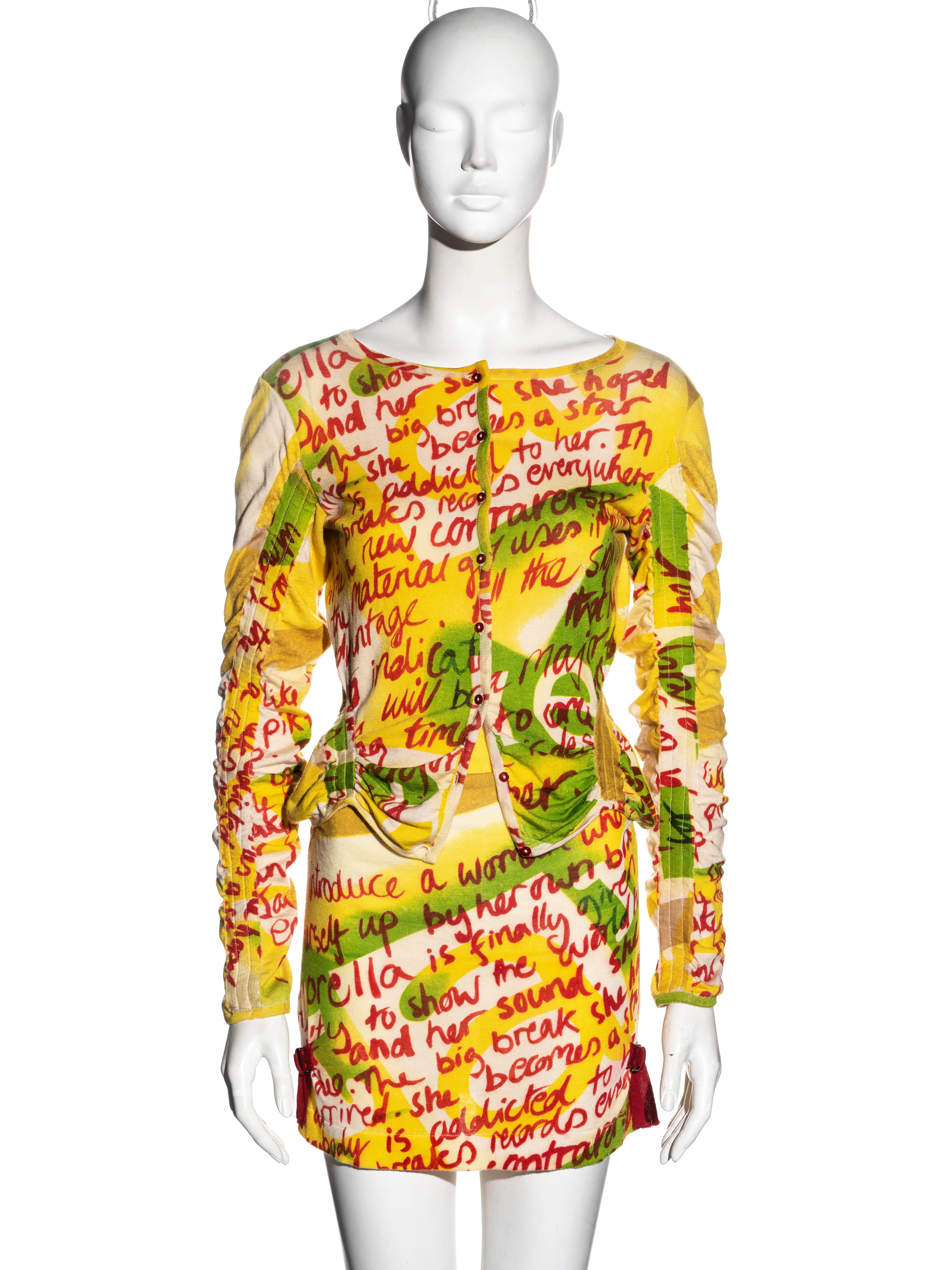 ▪ Christian Dior cardigan and mini skirt set
▪ Designed by John Galliano
▪ Yellow, green, red and cream graffiti print
▪ Ruched seams 
▪ Tie fastening at the skirt waist 
▪ Size approx. Small-Medium
▪ Spring-Summer 2003
▪ Made in France