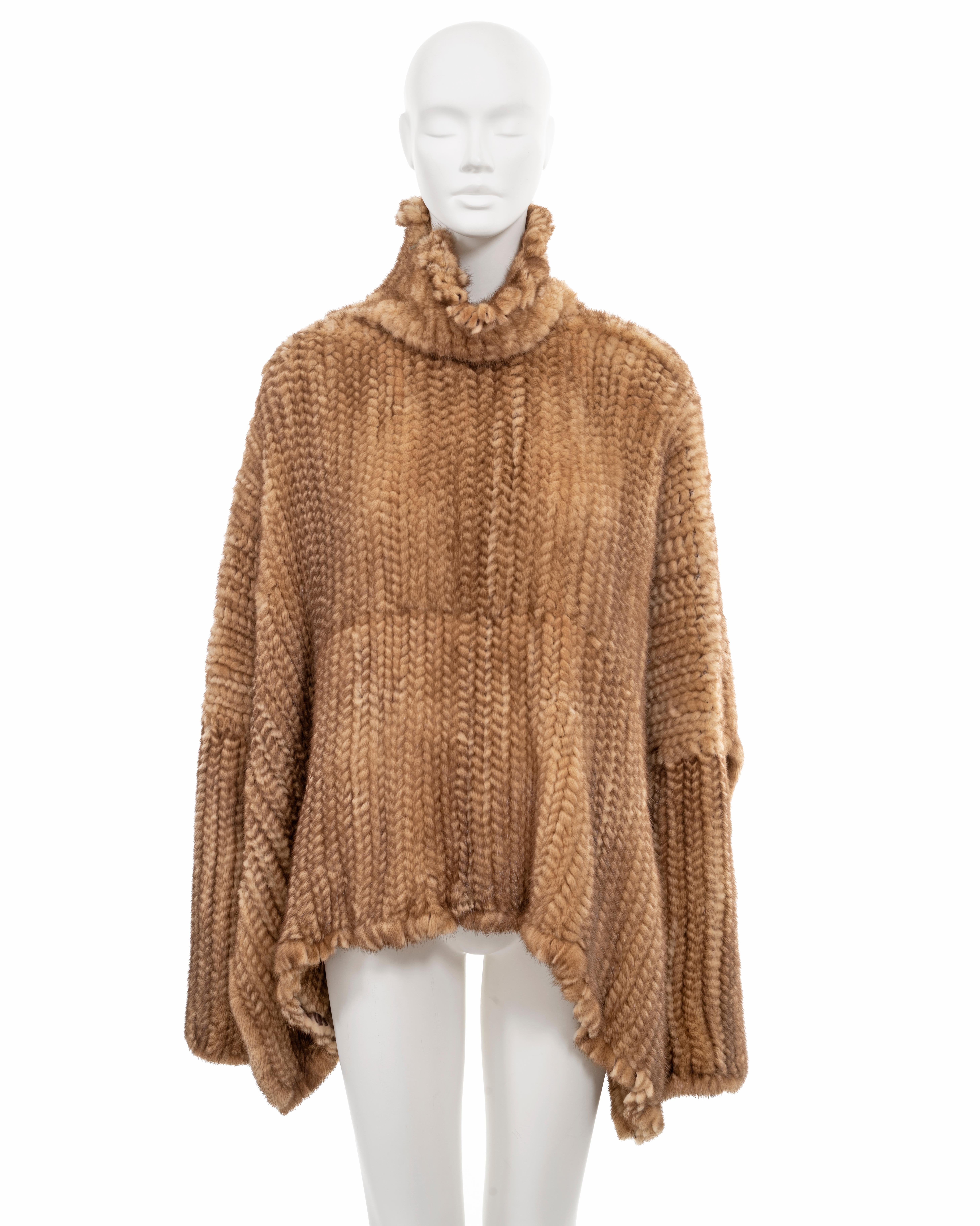▪ Christian Dior fur sweater
▪ Creative Director: John Galliano
▪ Sold by One of a Kind Archive
▪ Fall-Winter 2000
▪ Constructed from knitted mink fur ribbons 
▪ Fringed trim 
▪ Wide cut 
▪ Oversized fit 
▪ High-low hemline 
▪ One Size
▪ Made in
