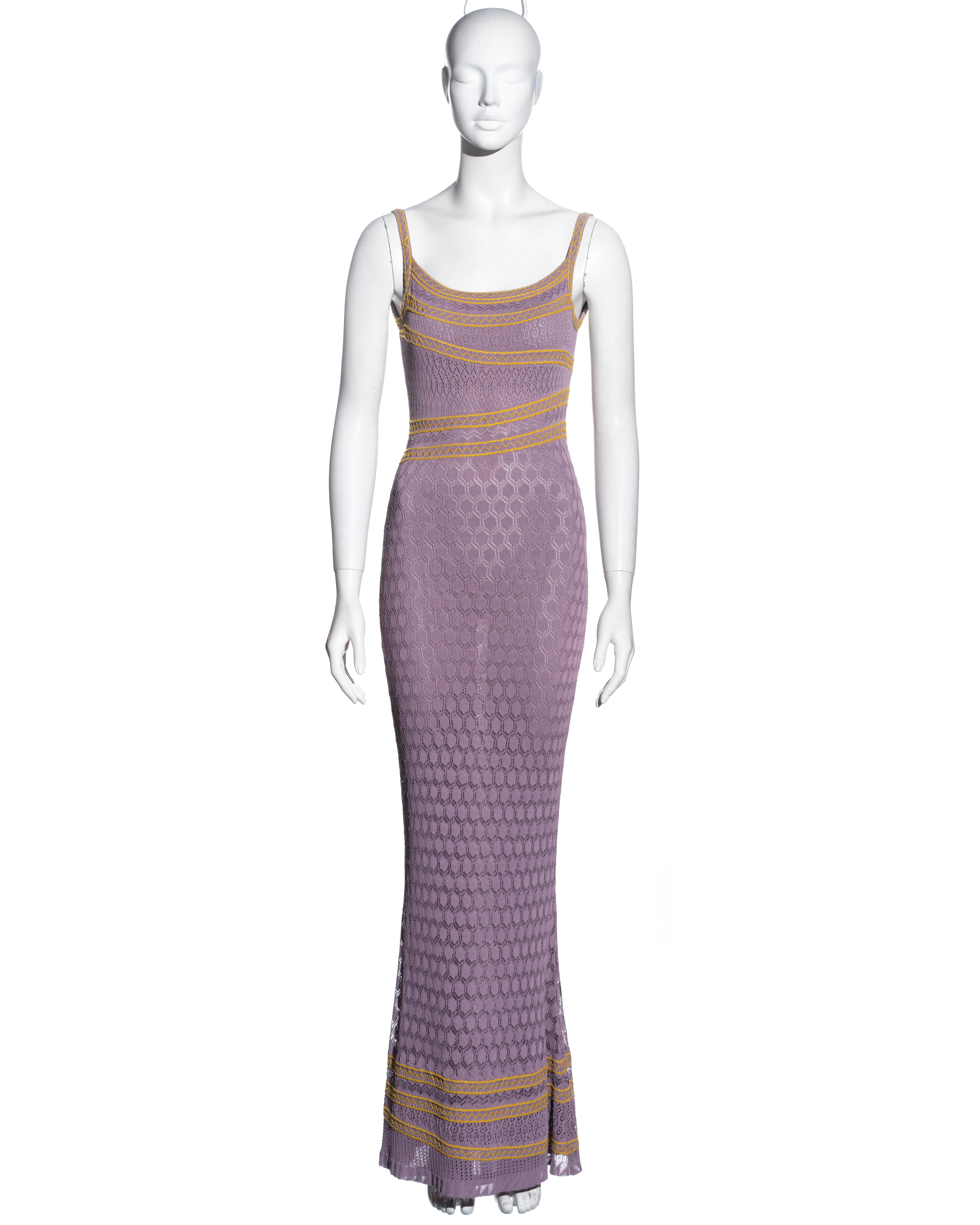 ▪ Christian Dior maxi dress
▪ Designed by John Galliano
▪ Lavender viscose crochet lace 
▪ Canary yellow zigzag stitch trimmings 
▪ Figure hugging 
▪ Rayon-knit underdress attached 
▪ Maxi-length 
▪ Size FR 40 
▪ Spring-Summer 2000
▪ 90% Viscose,