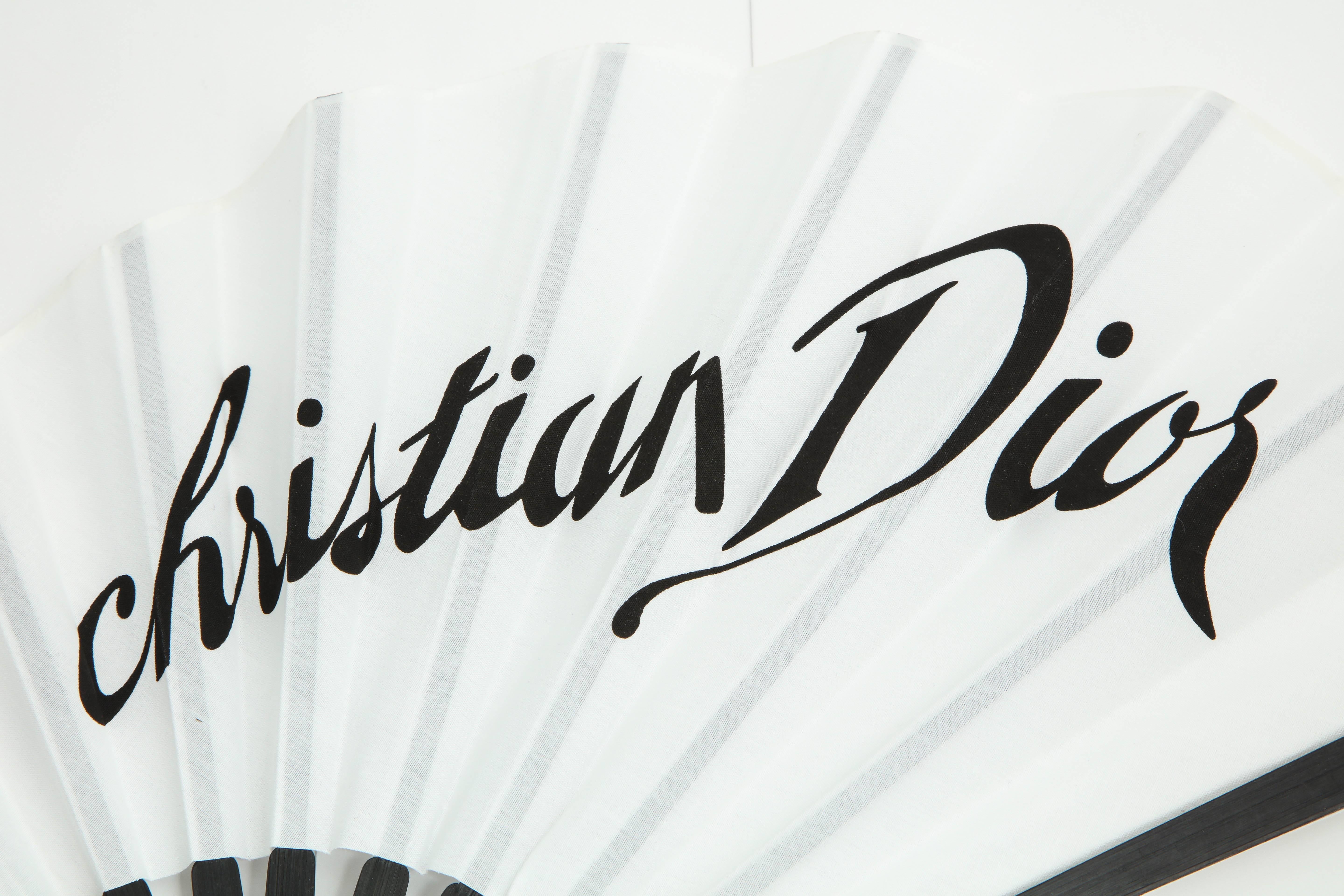 Extremely rare Christian Dior by John Galliano fan in black and white. 
Made of fabric.