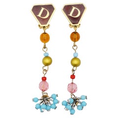 CHRISTIAN DIOR by John Galliano Masai 1990s Gripoix Logo D Tassel Clip Earrings