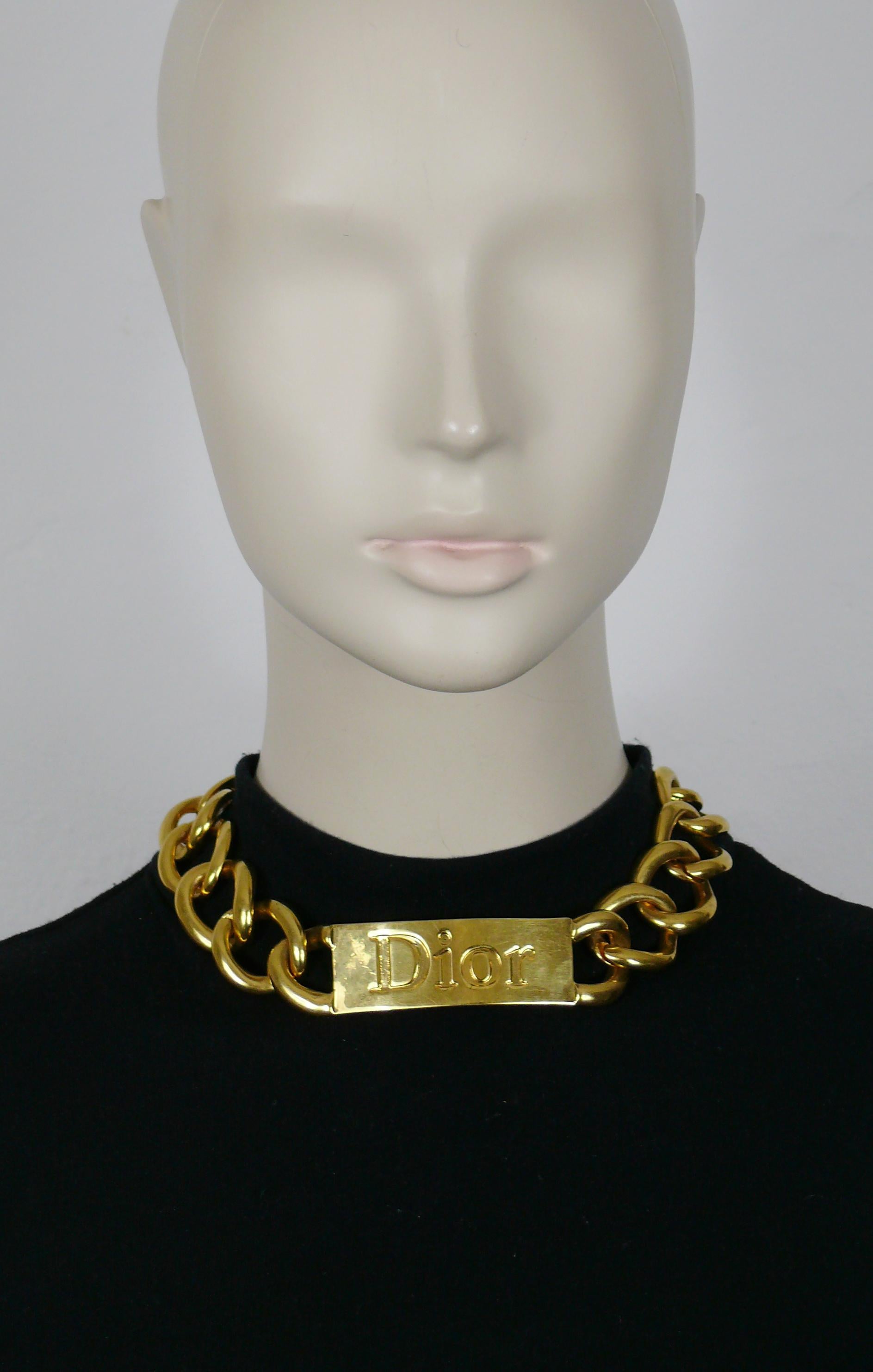 CHRISTIAN DIOR by JOHN GALLIANO massive gold tone runway necklace featuring curb links and ID tag embossed DIOR.

CHRISTIAN DIOR Ready-To-Wear Fall 2000-2001.

Hook clasp closure.

Embossed DIOR ®.

Indicative measurements : adjustable length from