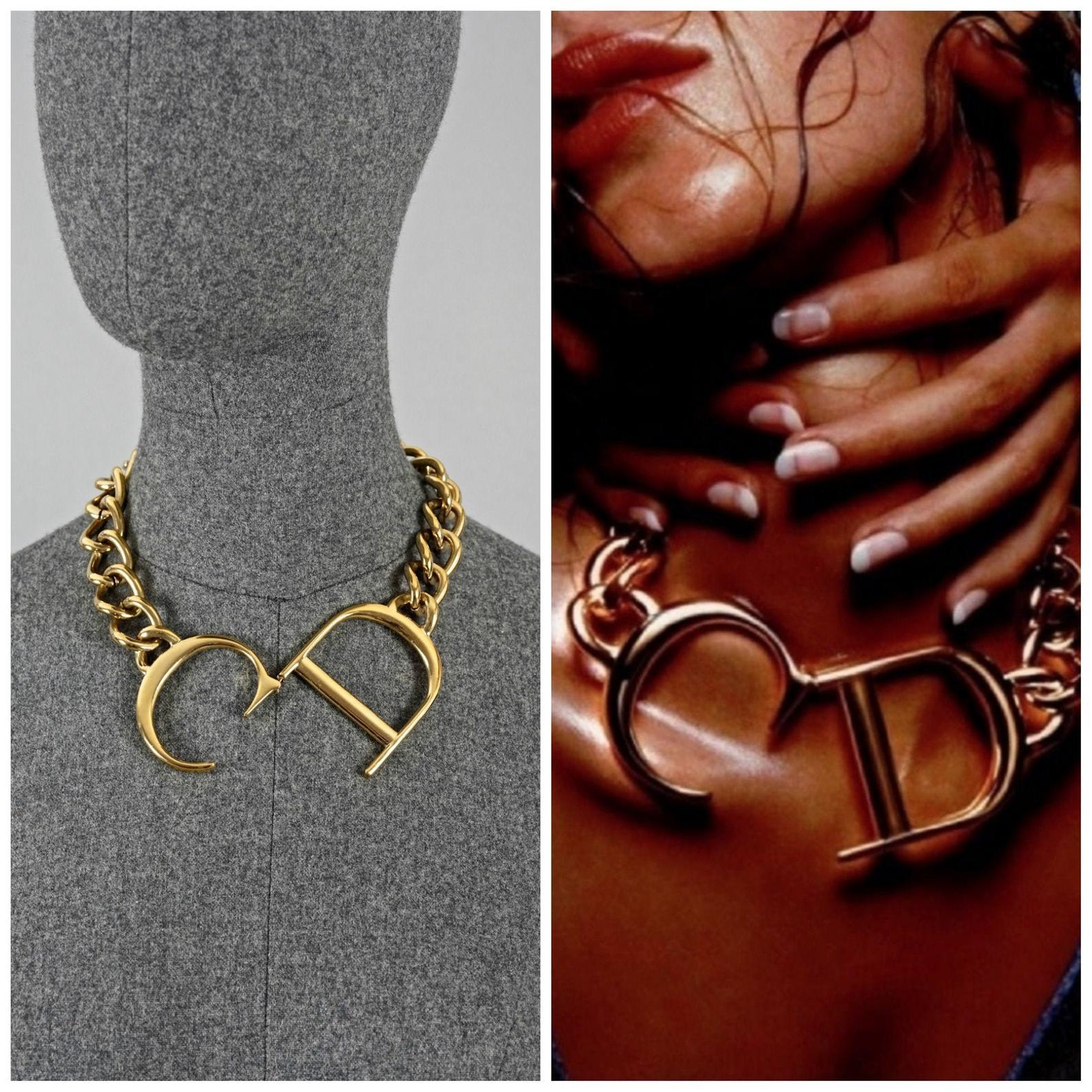 This is the bigger version same collection used in the Dior publicity. Very rare and almost impossible to find.

Features:
- 100% Authentic CHRISTIAN DIOR.
- Massive CD Monogram centrepiece.
- Chunky chain.
- Gold tone.
- Adjustable hook and loop