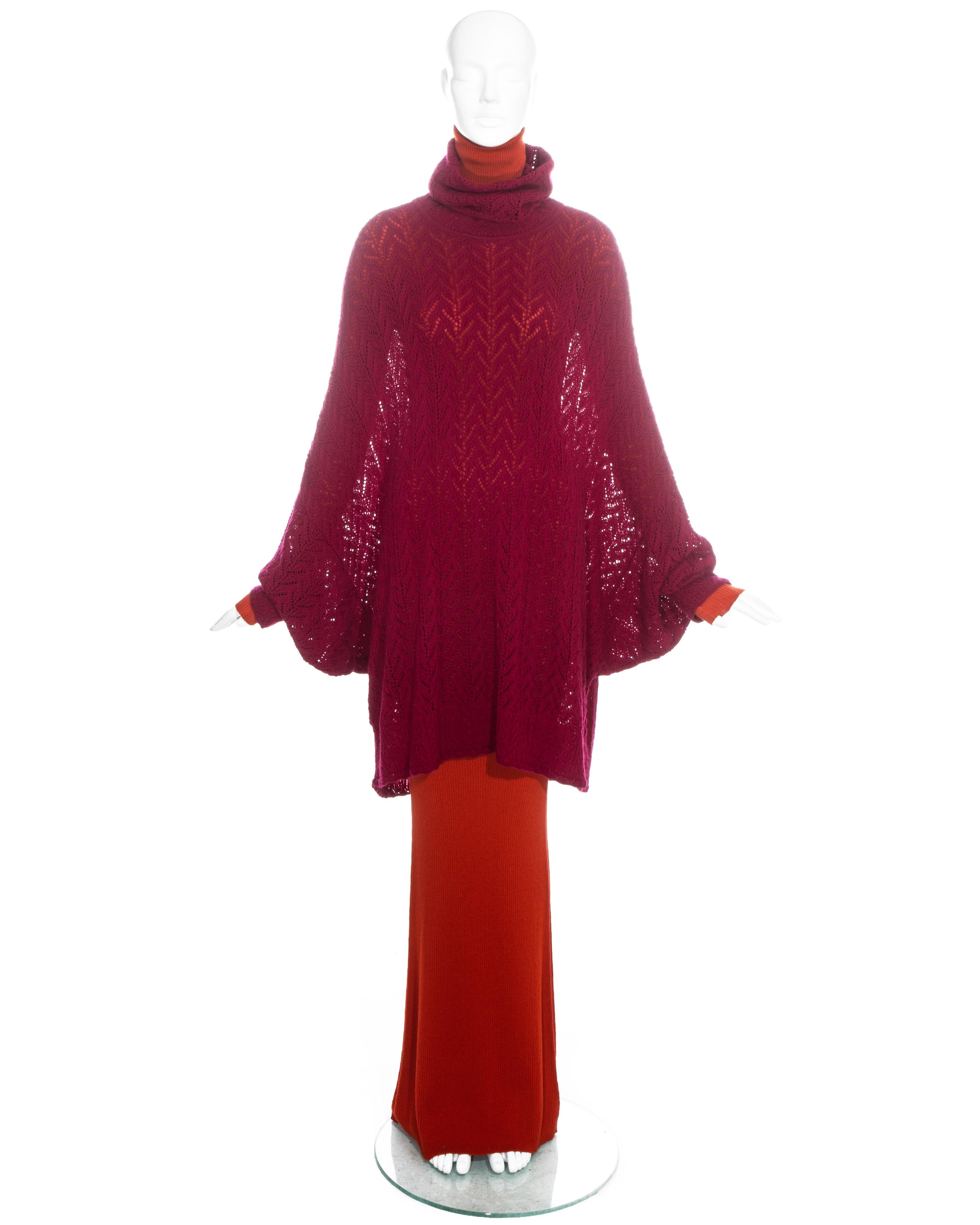 Christian Dior by John Galliano orange and maroon knitted ensemble comprising: rib-knit maxi dress with turtle neck and oversized crochet-knit sweater with bat wing sleeves and large collar. 

Fall-Winter 1998