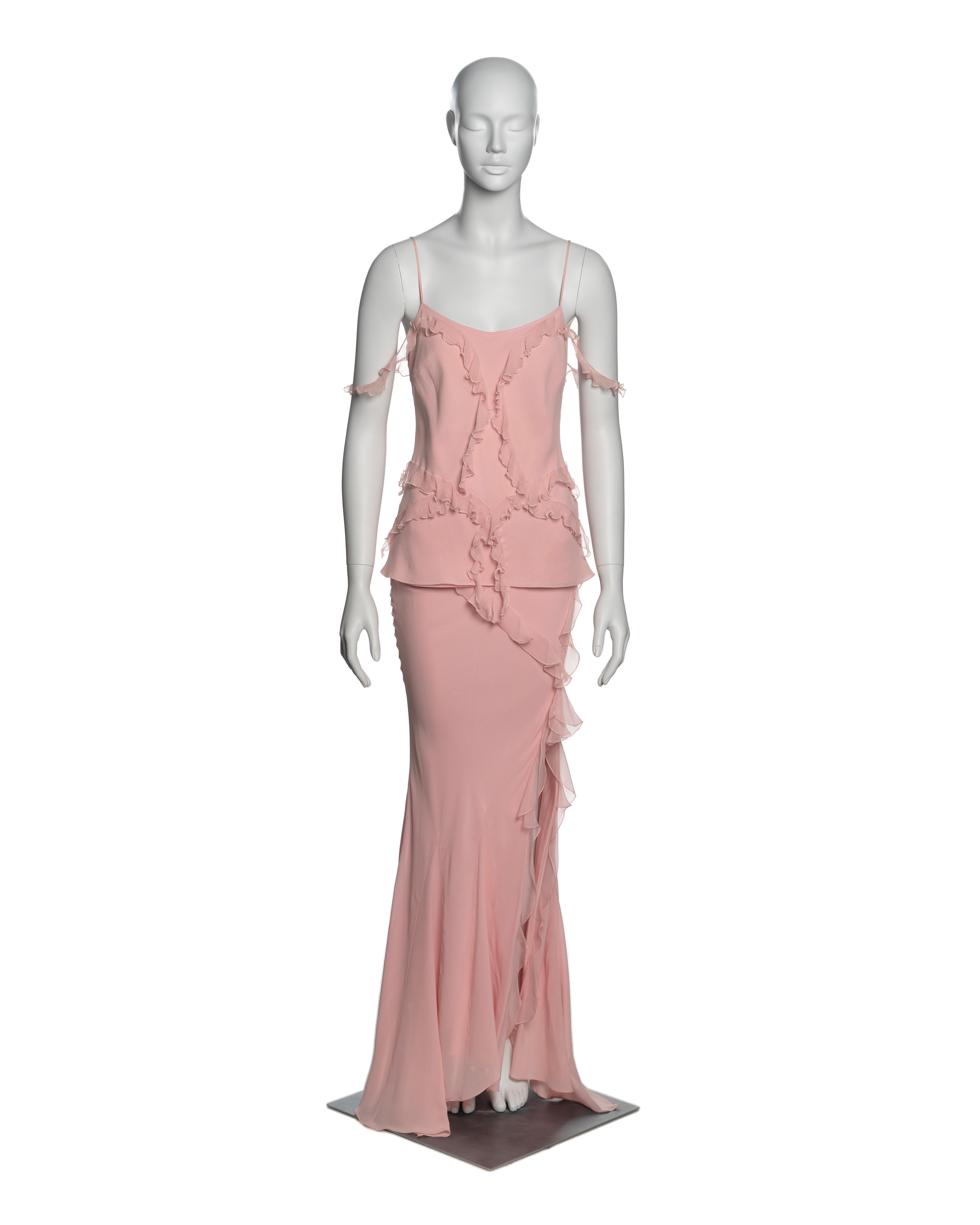 ▪ Brand: Christian Dior
▪ Creative Director: John Galliano
▪ Collection: Fall-Winter 2004
▪ Fabric: Pink Silk
▪ Details: This ensemble comprises a camisole top paired with a matching maxi skirt. The top features cascading chiffon ruffle inserts that