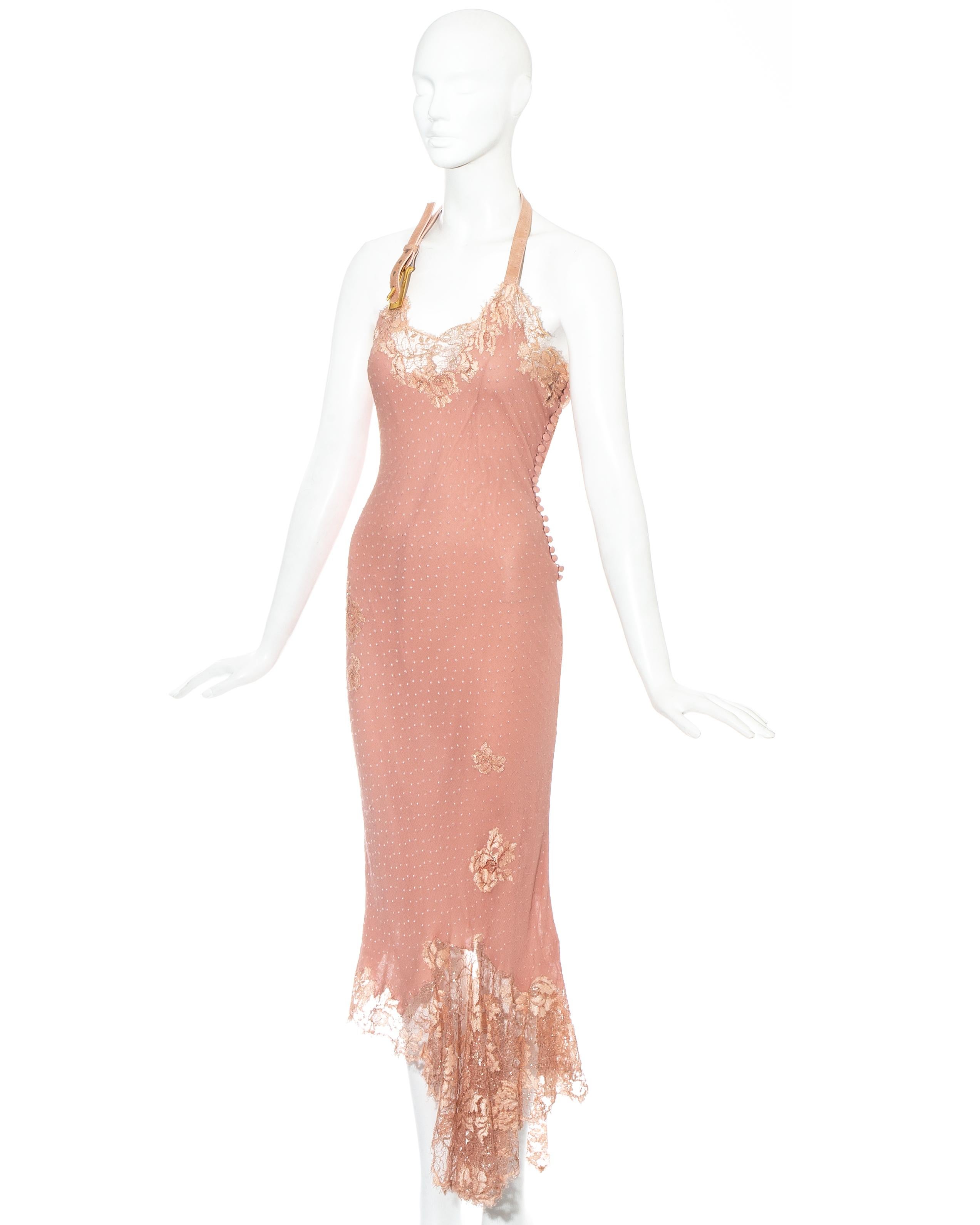 Christian Dior by John Galliano; pink lingerie inspired evening dress. Jacquard silk chiffon with metallic lace. Lambskin leather halter with large gold buckle fastening. 21 fabric button fastenings on side seam. Low back with drapery above