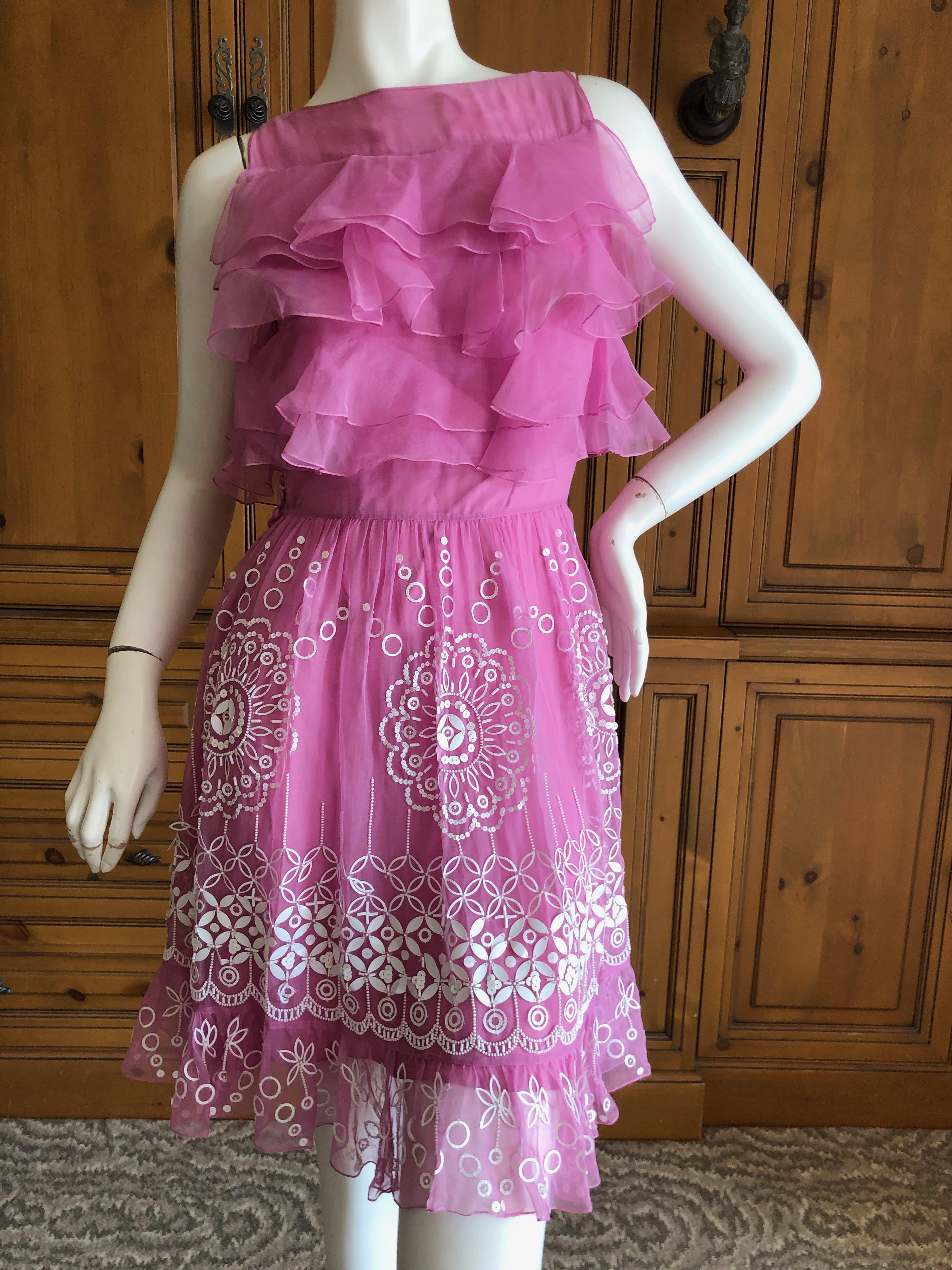 Christian Dior by John Galliano Pink Silk Dress with White Embellishments.
This is so pretty, please use the zoom to see the details.
The ornamentation is amazing, each sequin hand sewn in a folkloric pattern.
 Size 38
Bust 36