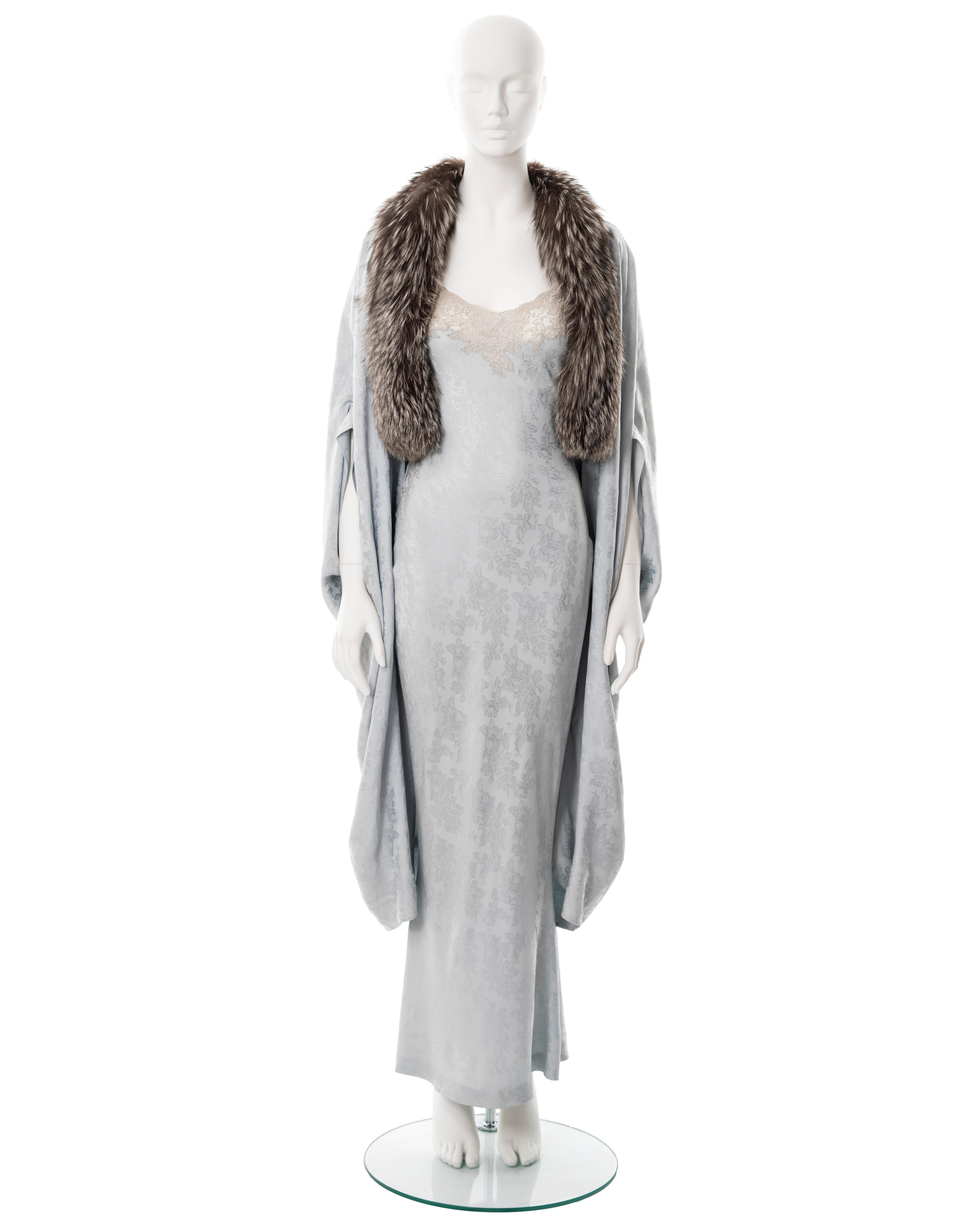 ▪ Christian Dior evening slip dress and cocoon coat set 
▪ Designed by John Galliano
▪ Fall-Winter 1998
▪ Coat constructed from powder blue floral cashmere-wool jacquard 
▪ Slip dress constructed from powder blue bias-cut floral silk-jacquard 
▪ Fox