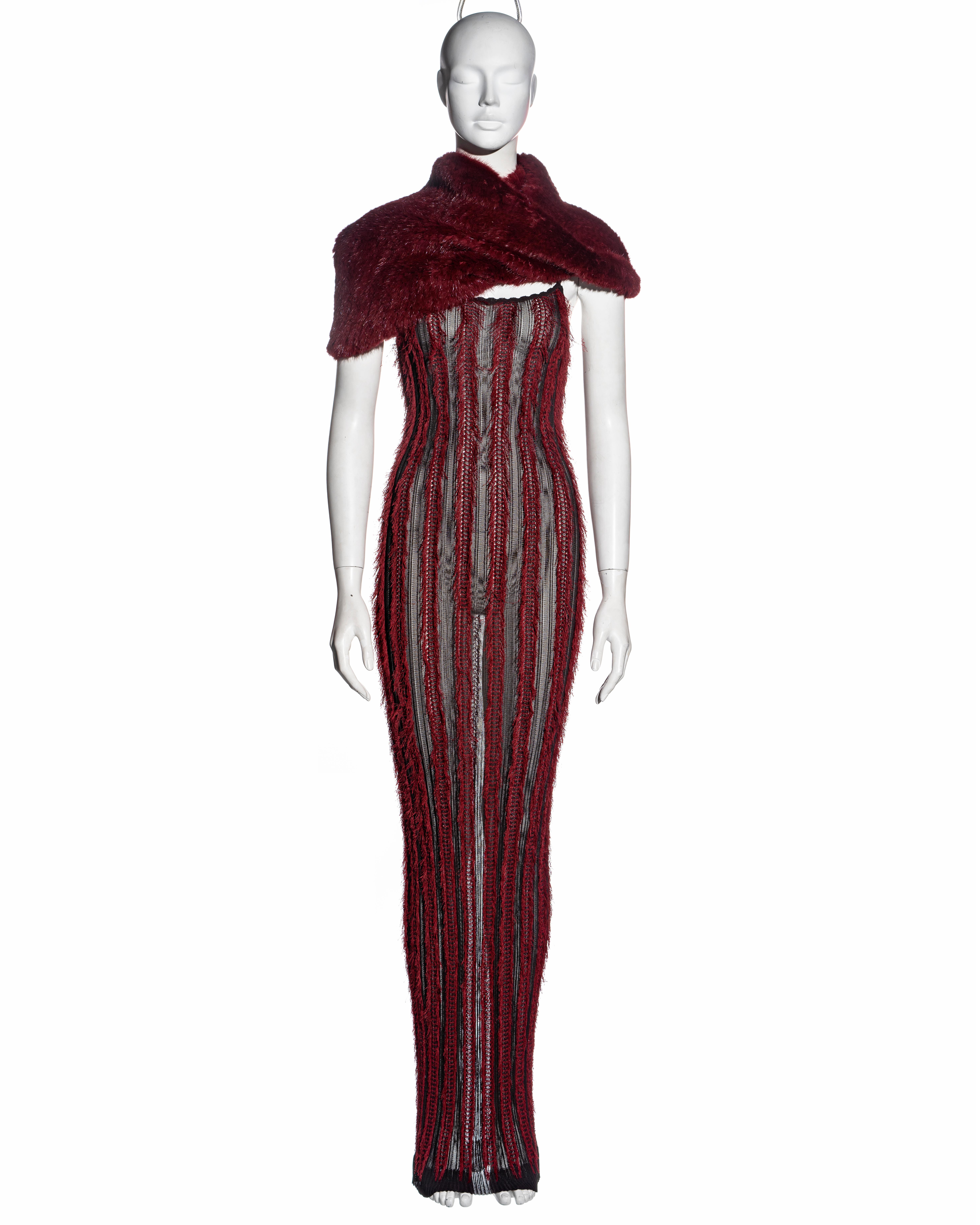 ▪ Christian Dior black and red floor-length dress and snood 
▪ Designed by John Galliano 
▪ Vertical fringe stripes 
▪ Rabbit-fur snood 
▪ Figure-hugging 
▪ Spaghetti straps 
▪ Sold with matching black underdress (not pictured) 
▪ FR 38 - UK 10 - US