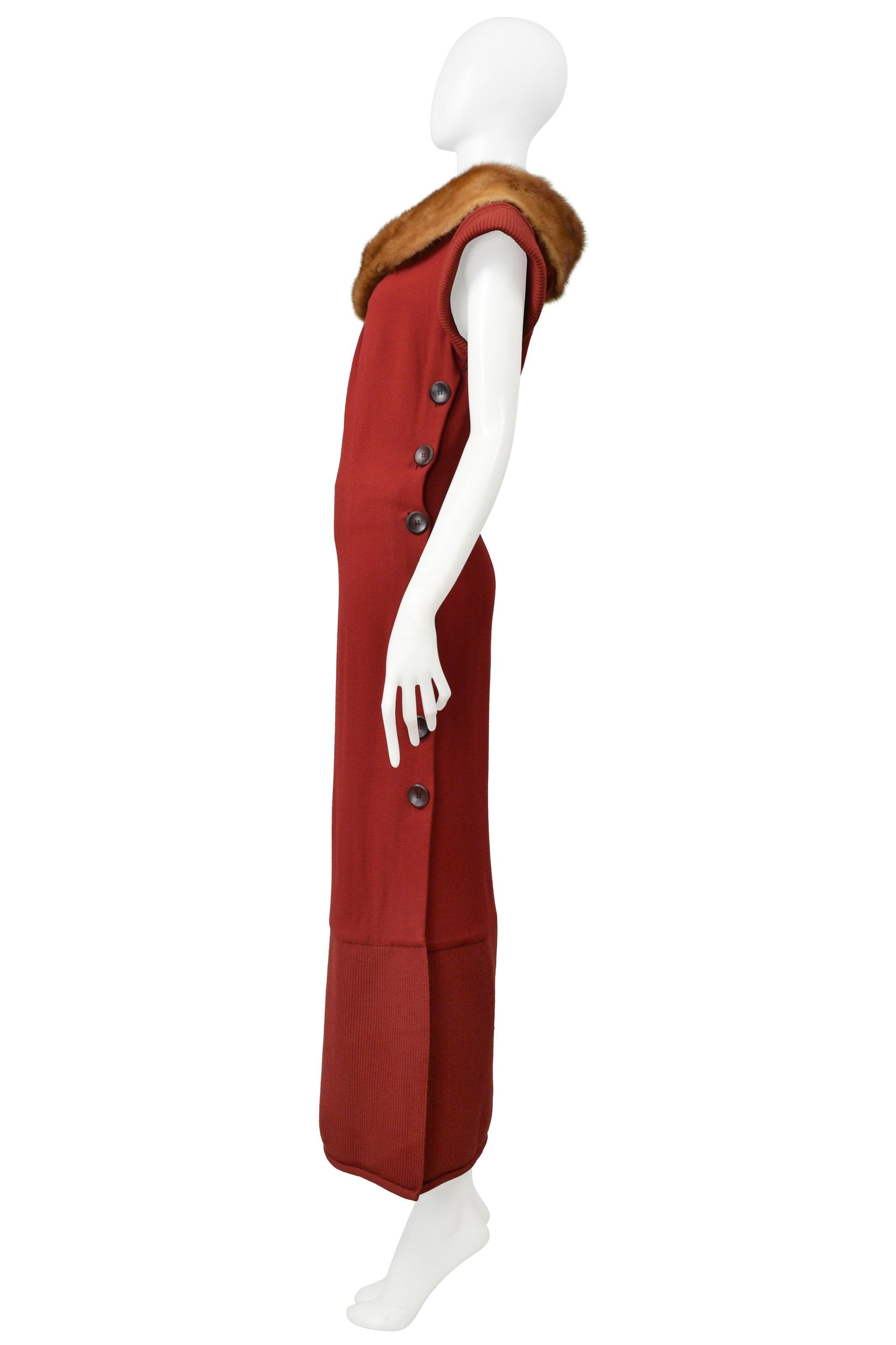 Resurrection is excited to offer a vintage Christian Dior by John Galliano deep red knit dress featuring a stunning mink fur collar, straight body, large black buttons on one side, contrasting knit sleeves, and hem panel.

* Christian Dior Paris
*