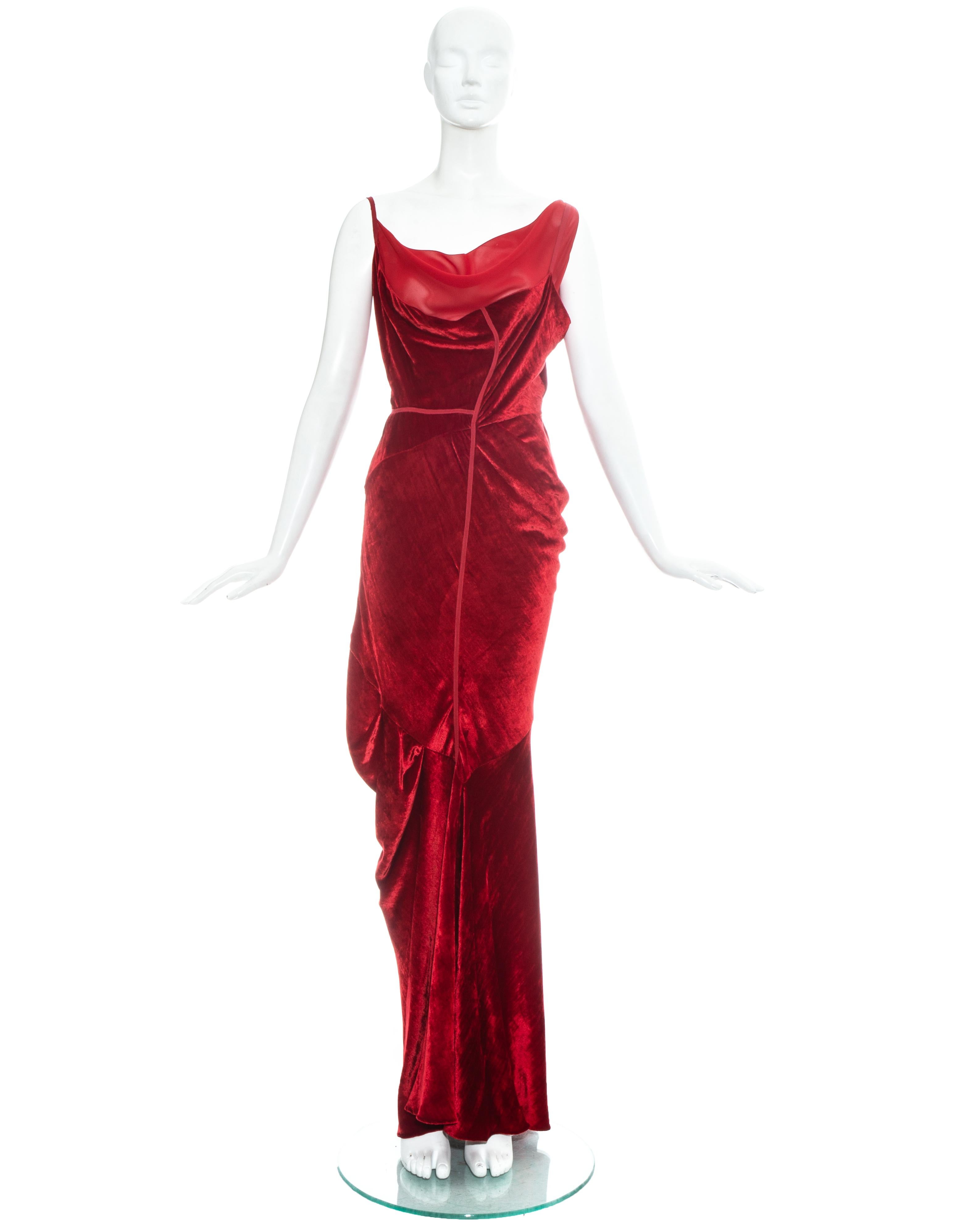 Christian Dior by John Galliano red velvet bias cut evening dress with silk chiffon underlay, ribbon appliqués, and asymmetric drapes throughout.

Fall-Winter 2006