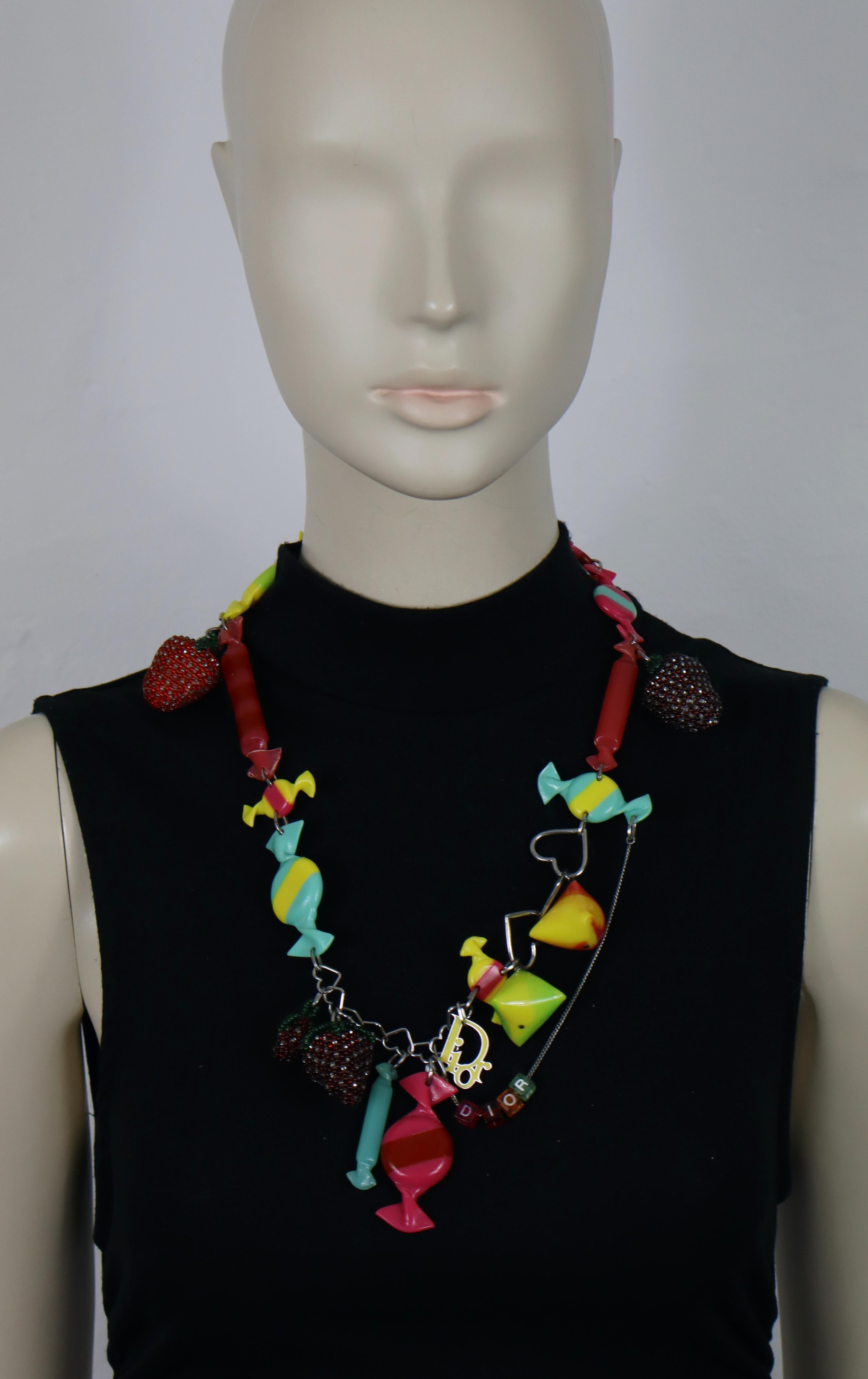 CHRISTIAN DIOR by JOHN GALLIANO vintage necklace featuring resin candies, beaded strawberies, DIOR charm and silver tone heart links.

Adjustable lobster clasp.

Spring/Summer Ready-to-Wear 2005 Collection (see picture 3).

Unsigned.

Indicative