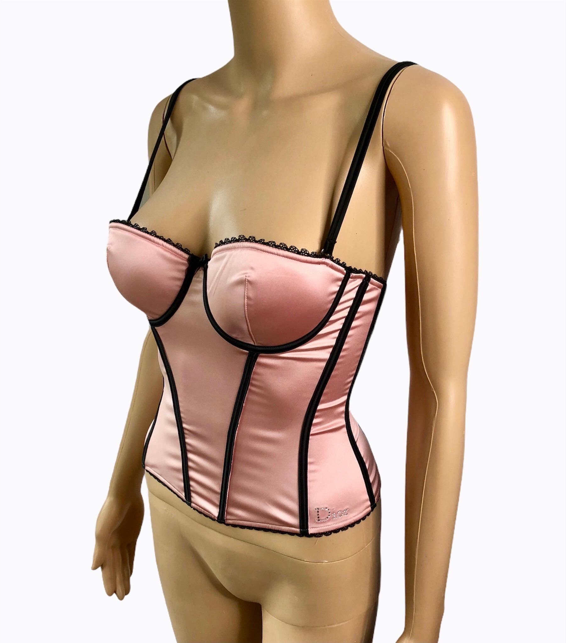 Christian Dior By John Galliano S/S 2002 Unworn Bustier Silk Pink Corset Top Size 32C

Christian Dior by John Galliano silk bustier top featuring crystal embellished logo, detachable straps, padded bust, and hook-and-eye closure.

