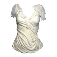 Christian Dior, diseño de John Galliano, primavera-verano 2005: top drapeado con volantes en color crema
