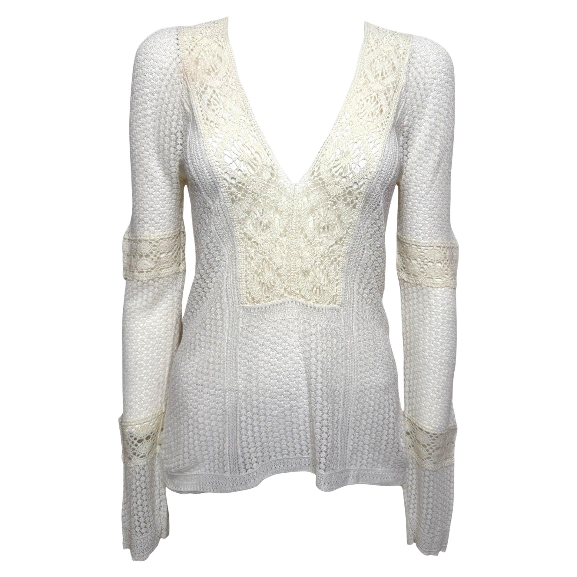 Christian Dior, diseño de John Galliano, primavera-verano 2005: top blanco de punto calado con inserciones de encaje