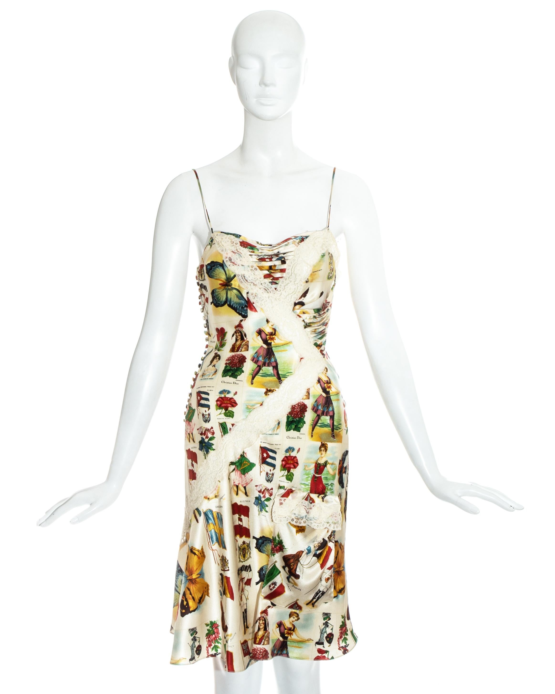 Christian Dior by John Galliano; novelty printed silk slip dress with bias cut lace panels. Two open patch pockets, draped ribbon panels, spaghetti straps and multiple fabric button fastenings on side seam. 

Spring-Summer 2002