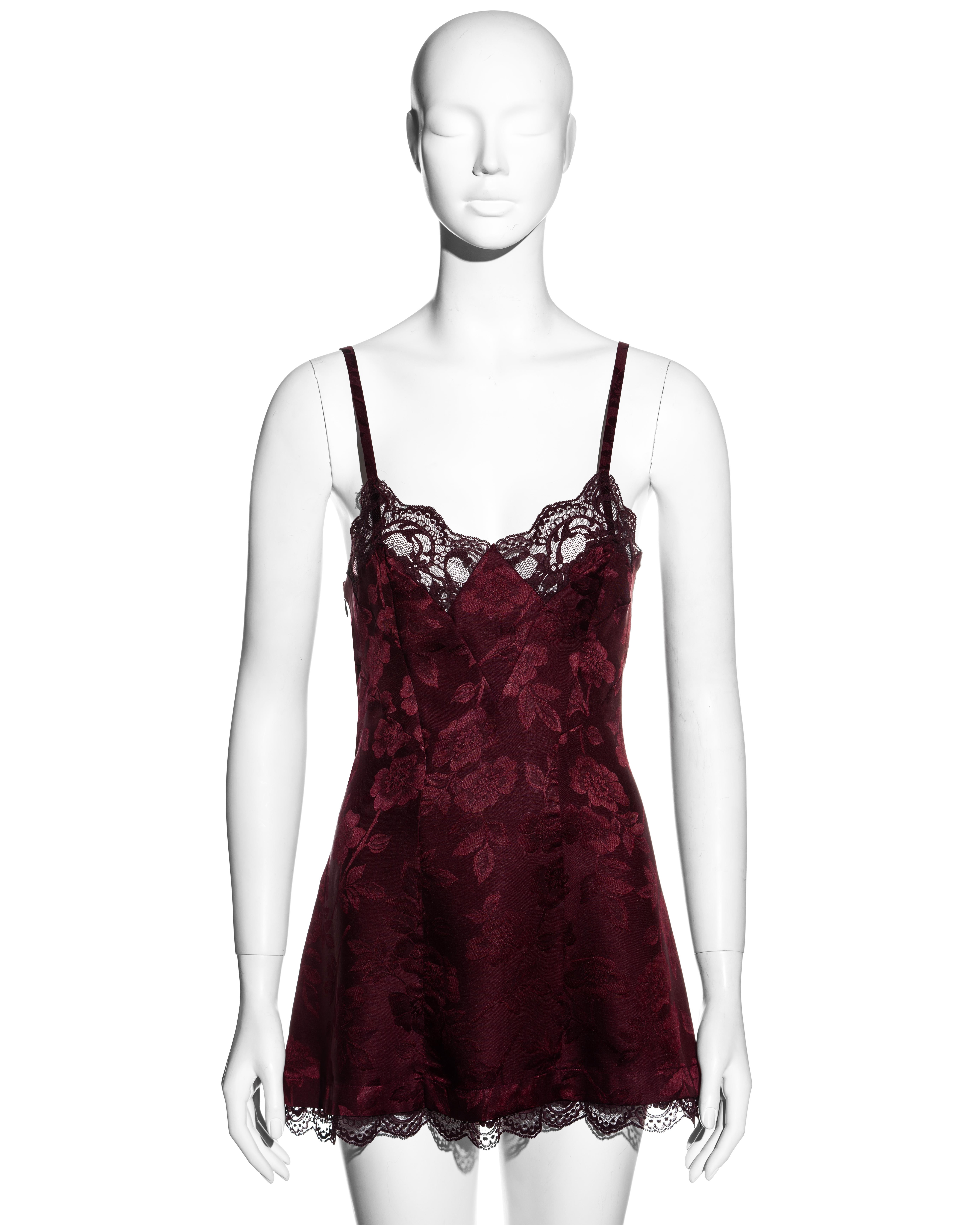 ▪ Christian Dior micro mini slip dress
▪ Designed by John Galliano
▪ Floral silk jacquard 
▪ Lace trim 
▪ A-line 
▪ Can be worn as a micro mini dress or long evening top
▪ FR 36 - UK 8 - US 4
▪ Fall-Winter 2005
▪ 100% Silk 
▪ Made in France