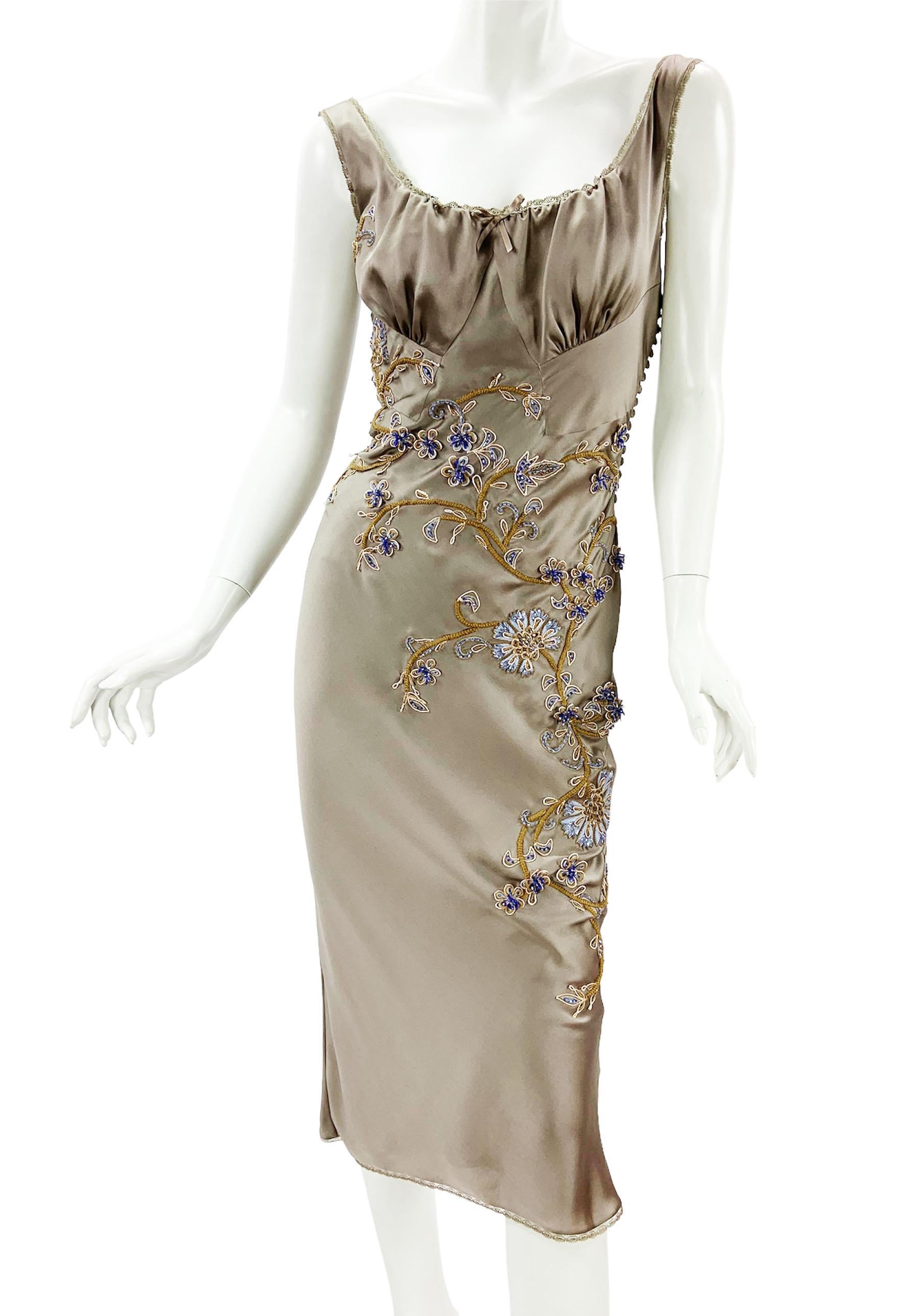 Christian Dior by John Galliano Silk Nude Embroidered Cocktail Dress
French size 38 ( US 6 )
S/S 2006 Collection
Christian Dior transports fashion to a romantic era with this draped dress.
100% silk, Delicate floral embroidery and beads, Signature