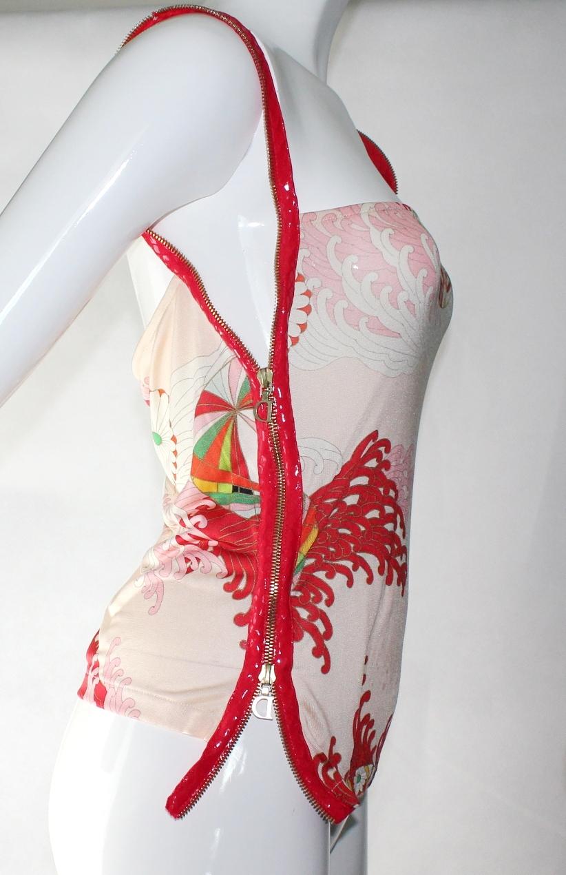 A rare piece - you won't find anyone wearing the same!
Gorgeous piece John Galliano for Christian Dior
With the zipper featured in the 2001 collection
Softest printed silk
Zipper detail on both sides with two-way 