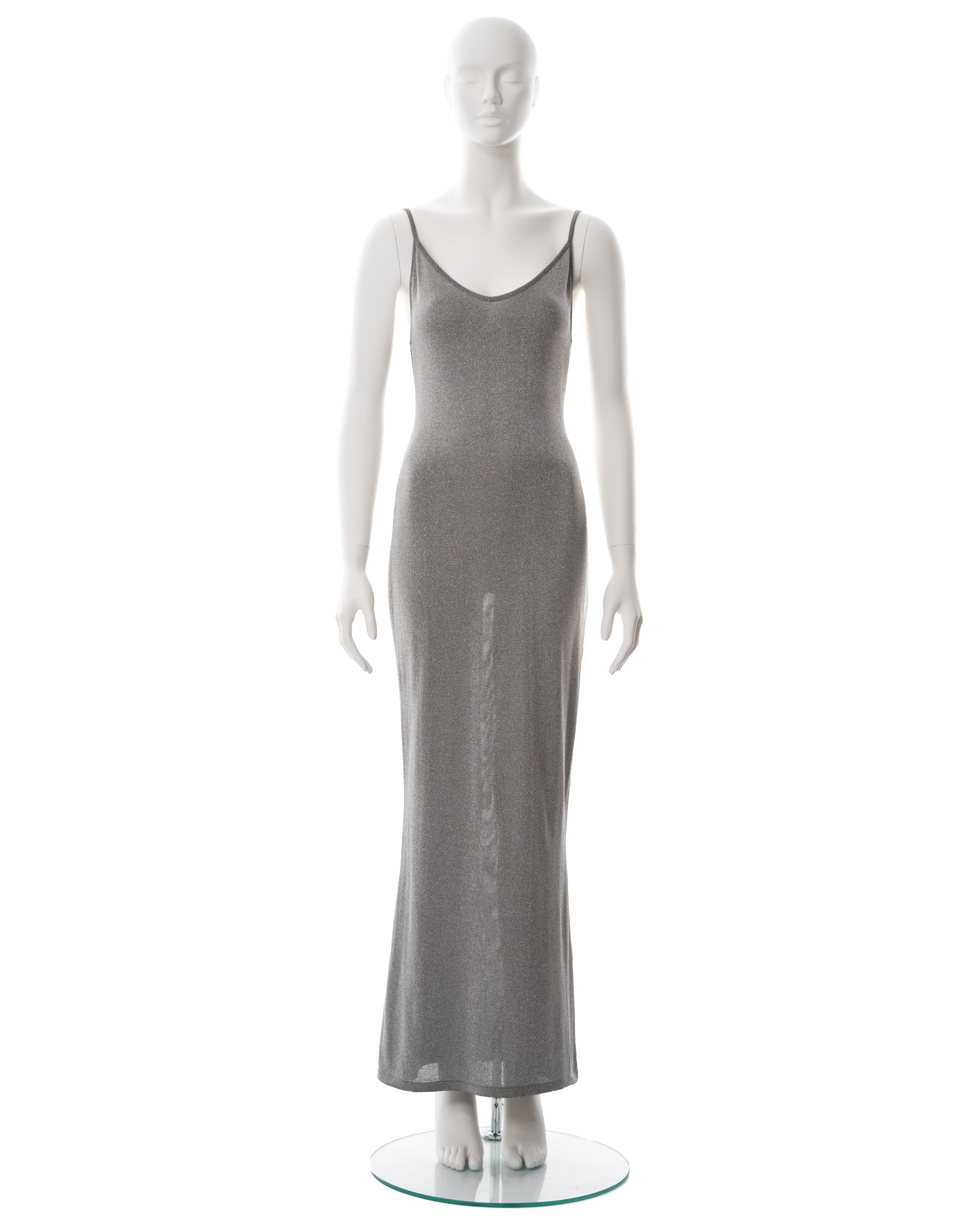 ▪ Christian Dior silver knitted lurex evening slip dress
▪ Designed by John Galliano
▪ Sold by One of a Kind Archive
▪ Fall-Winter 1998
▪ Figure-hugging fit 
▪ Scoop neck
▪ Spaghetti straps 
▪ Slip-on with no closures 
▪ Size: Medium
▪ Made in