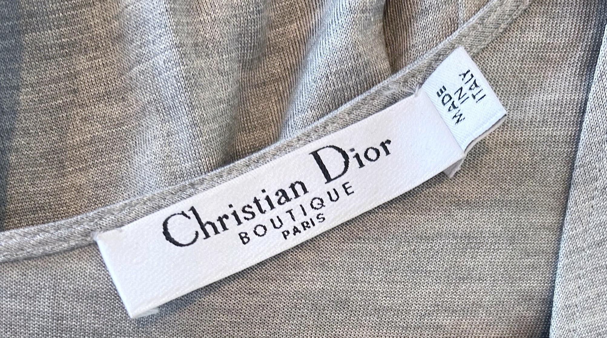 Easy, breezy and totally chic Christian Dior by John Galliano Spring/Summer 2007 gray silk short sleeve dress! The perfect heather grey color that is great for anytime of year. Hidden zipper up the side. Tailored bodice with a free flowing skirt.