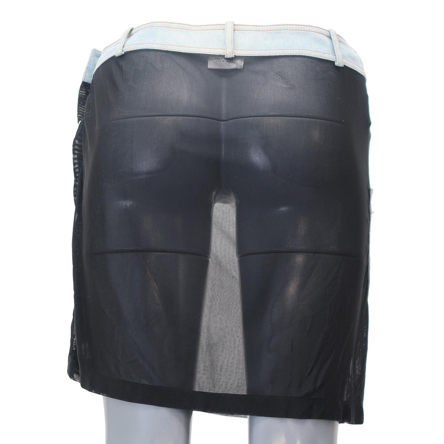 Mixing streetwear styles with high-end fabrications was a Galliano trademark during his years at Chrisian Dior, and this one of a kind skirt uses patchwork technique to striking effect. Crafted in nylon and body-conscious elastane, the skirt plays