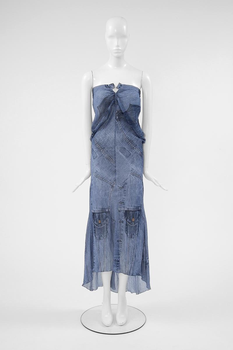 From the unmissable early 2000 John Galliano for Christian Dior collection, this strapless slip dress features the iconic “trompe l’oeil” denim print. Cut in a refined silk chiffon, this unlined dress has a slim fit which drapes beautifully over