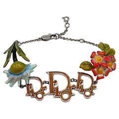 Braccialetto CHRISTIAN DIOR for Christian Dior by John Galliano Vintage con logo floreale smaltato