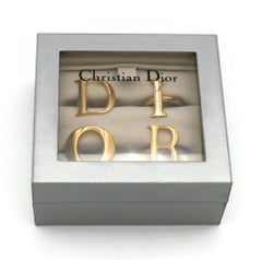 CHRISTIAN DIOR by JOHN GALLIANO Vintage God Toned Dior Letter Ring Set Boxed