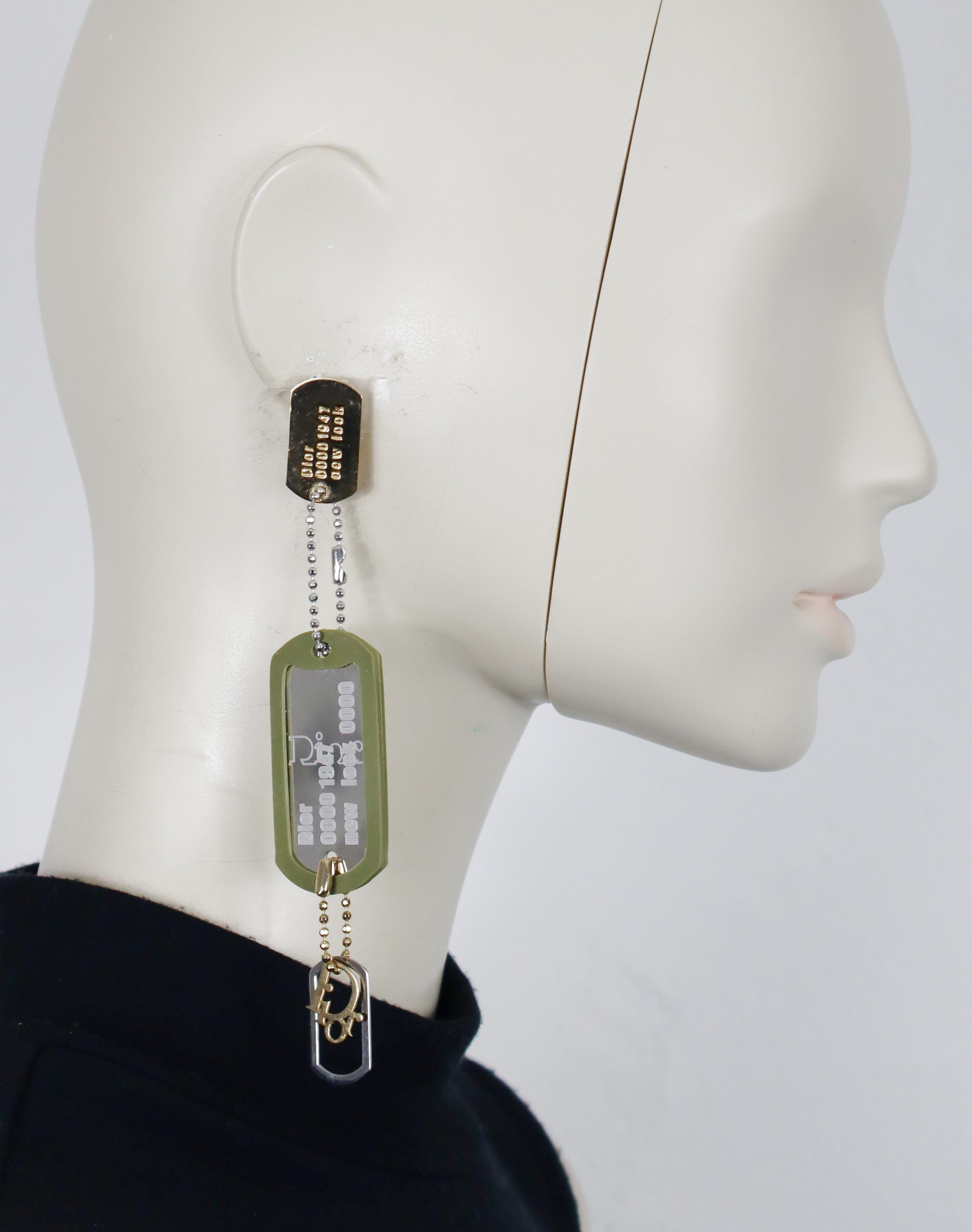 CHRISTIAN DIOR by JOHN GALLIANO vintage dangle earrings (clip-on) featuring two rectangular military ID tags embossed DIOR 0000 1947 New Look, and a DIOR charm.

Embossed DIOR ®.

Indicative measurements : height approx. 14.3 cm (5.63 inches) / max.