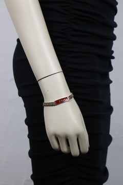CHRISTIAN DIOR par JOHN GALLIANO Bracelet vintage Rasta orné de bijoux