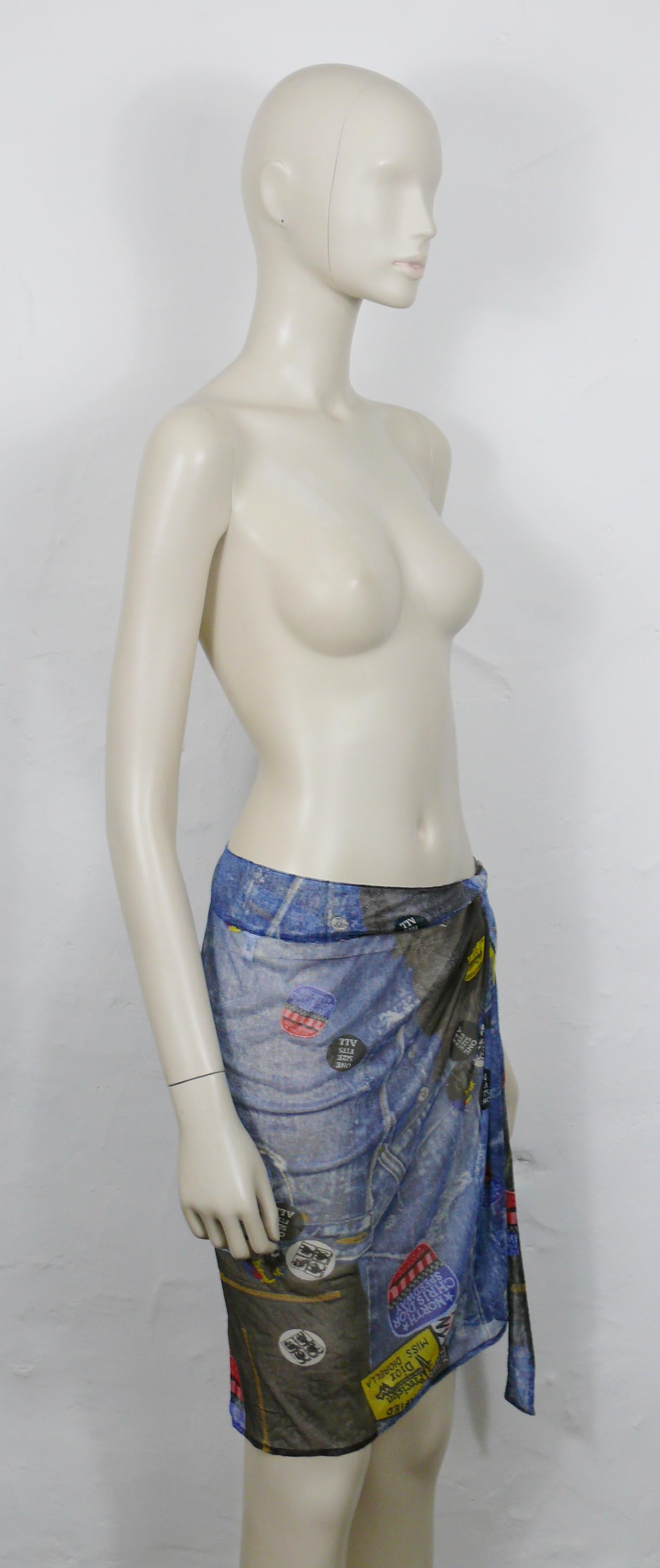 CHRISTIAN DIOR by JOHN GALLIANO vintage MISS DIORELLA wrap around sheer pareo featuring a denim trompe l'oeil print and patches.

Ties at the waist.

Label reads CHRISTIAN DIOR.
Made in France.

Missing size and composition tags.
Please refer to