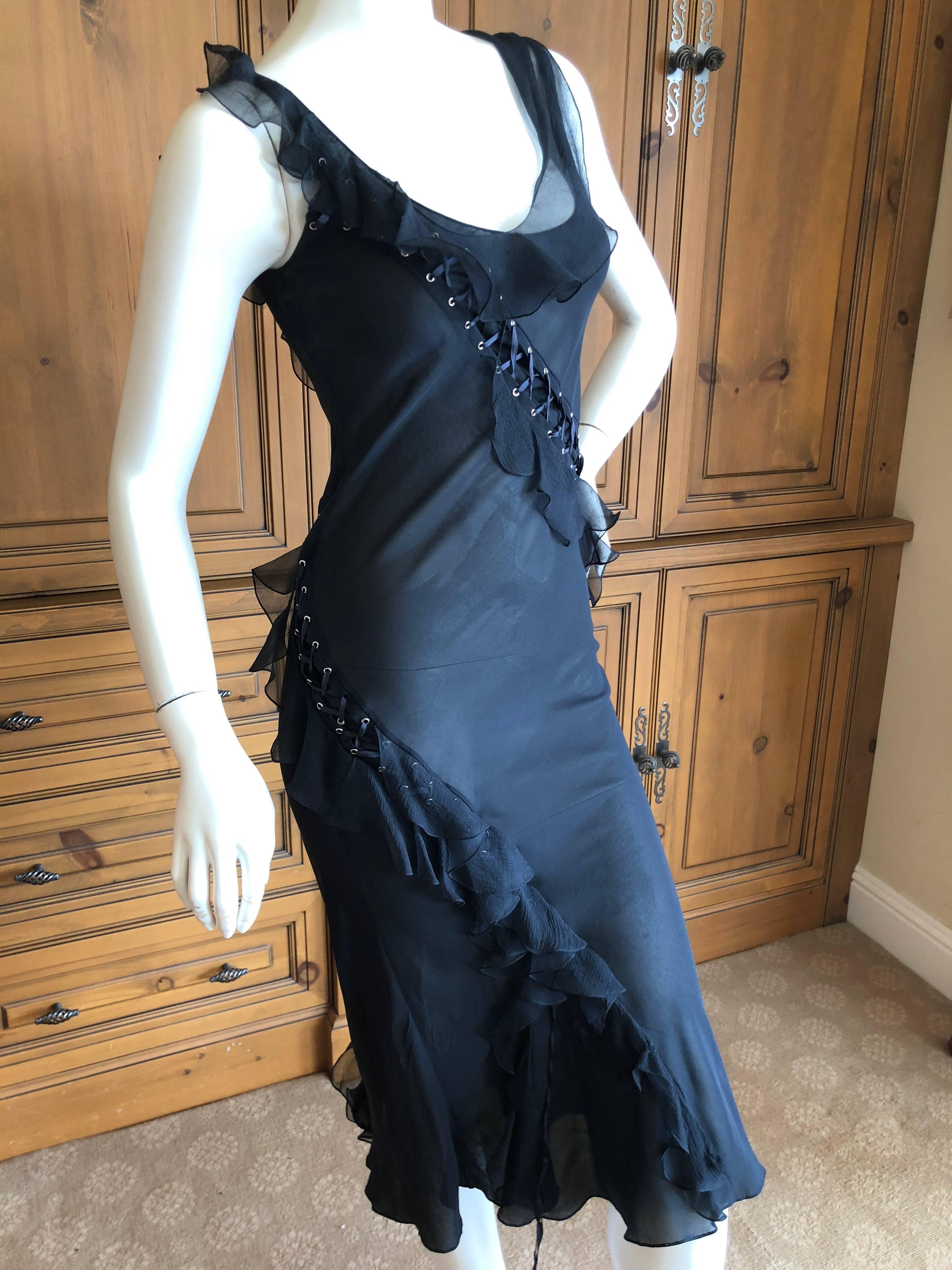 Christian Dior by John Galliano Vintage Sheer Black Dress with Spiraling Corset Lace Details.
Comes with slip, it is not intended to be worn so sheer, 
but many of my customers prefer it, so thats how I show it.
Sample, from Paris.
I have had this