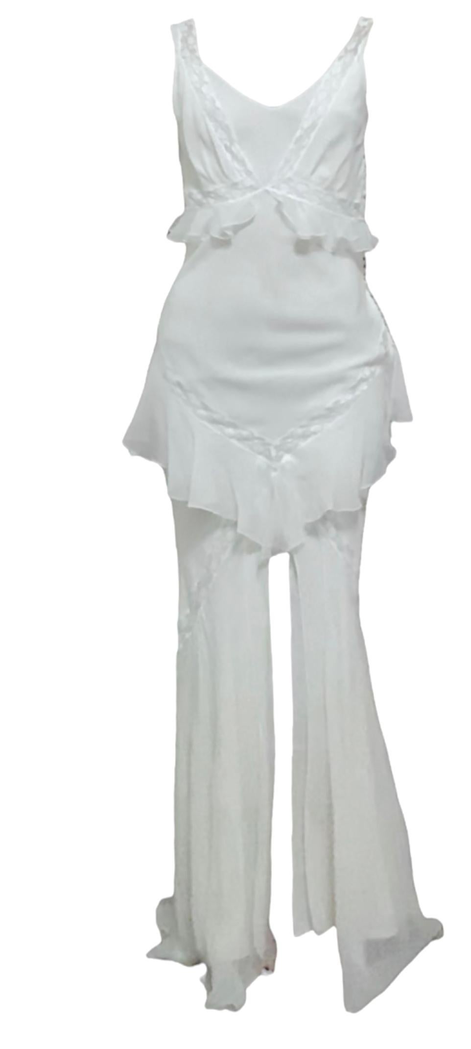 Rare, white silk Christian Dior by John Galliano from the Spring Summer 1999 collection. This two-piece gown features a simple white silk slip overlaid with a lace and ruffled layer with a plunging neckline and low cowl back. They belong together