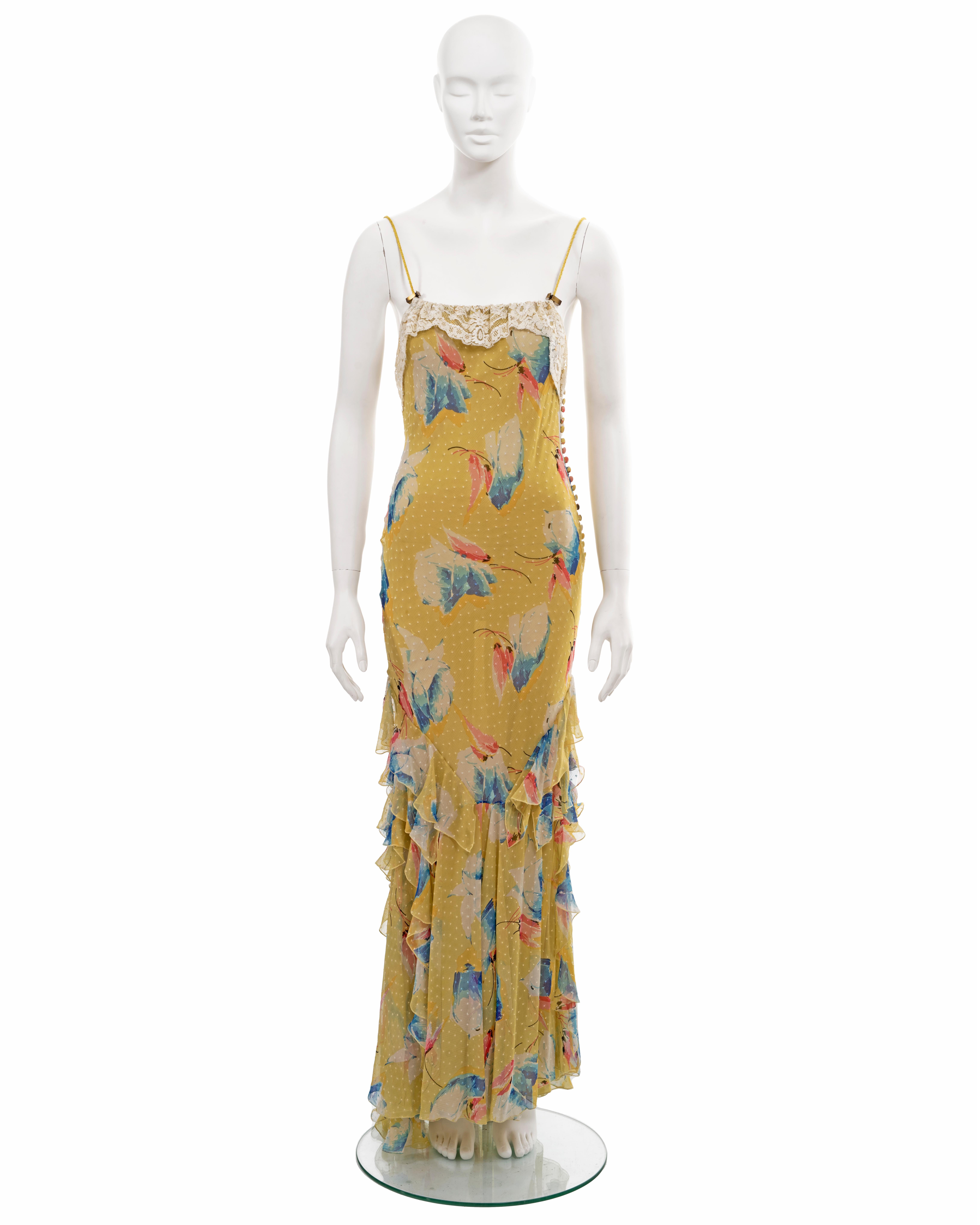 ▪ Christian Dior archival dress
▪ Creative Director: John Galliano
▪ Fall-Winter 2001
▪ Yellow bias cut silk chiffon with allover floral motif in blue, pink and cream
▪ Square neckline with cream cotton lace trim 
▪ Two drawstring spaghetti straps