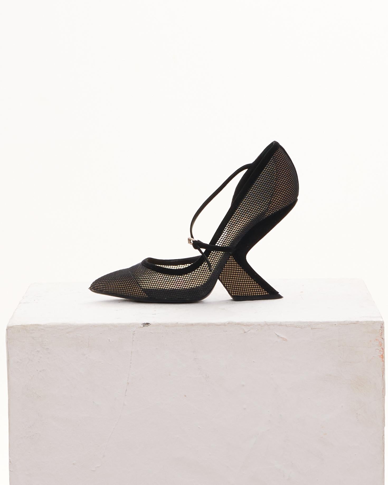 - Designed by Raf Simons
- Sold by Skof.Archive
- Fall-Winter 2013 
- Black mesh printed 
- Pointed-toes 
- Crossover Straps & buckle closure at uppers 
- Made in France 
- Size: EN 40
- Excellent conditions 
