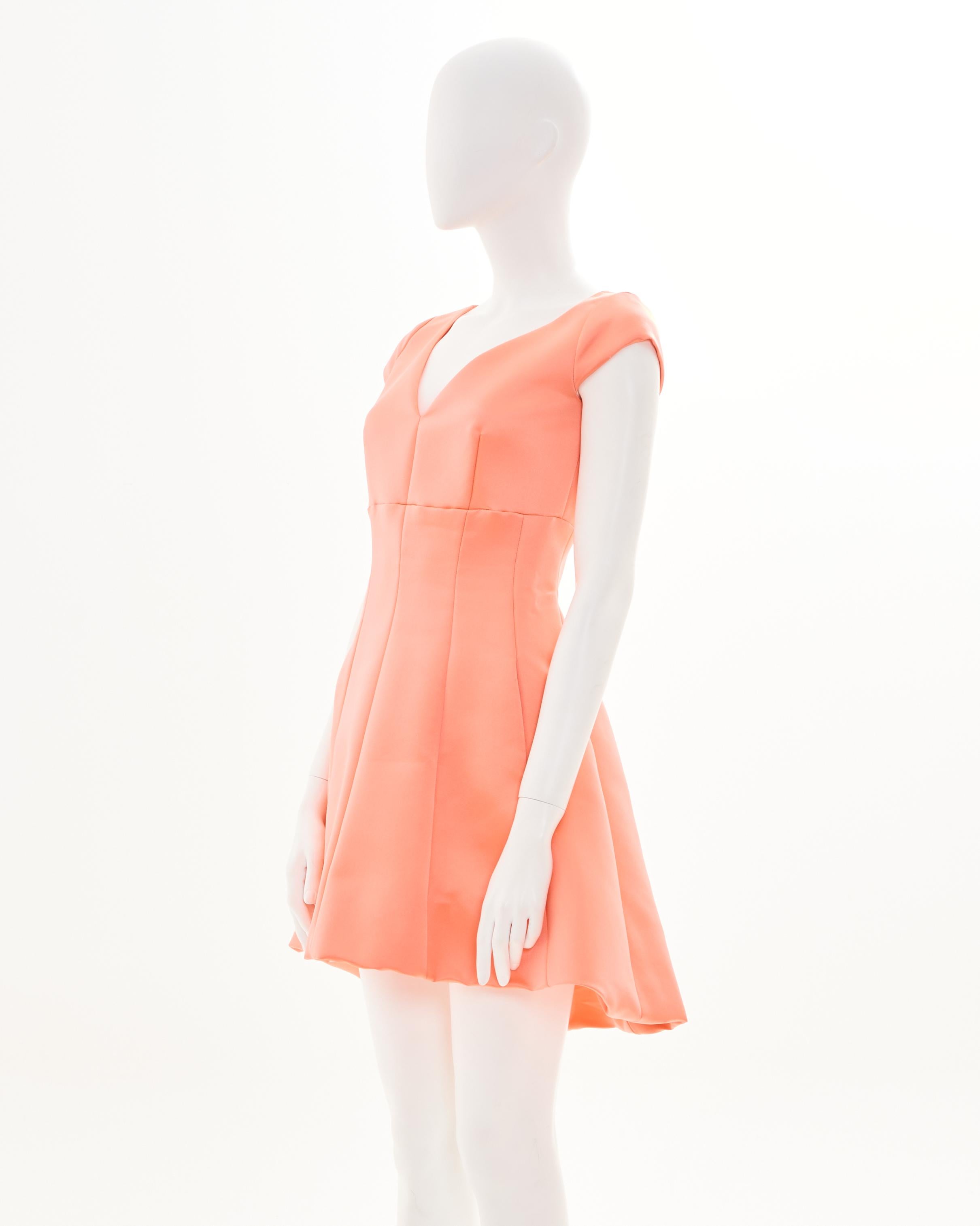- Designed by Raf Simons
- Sold by Skof.Archive
- Resort 2015 Collection
- Peach Asymmetric Dress
- Mini Length
- V-Neck
- Short Sleeves
- Open at the bottom
- Zip Closure on the back
- Excellent Condition
- Made in France
- Materials: 100% Silk
-