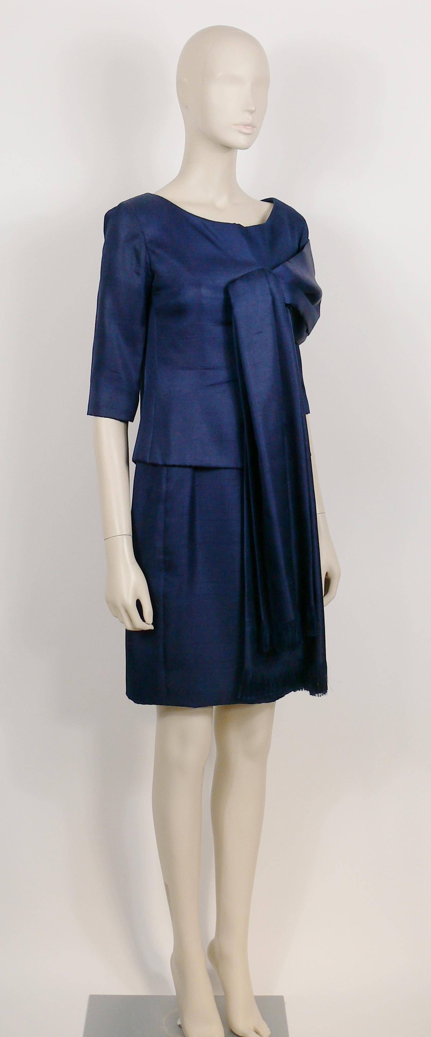 CHRISTIAN DIOR by YVES SAINT LAURENT Spring-Summer 1959 Haute-Couture faux two-piece blue cocktail dress.

This dress features :
- Faux two-piece design.
- 3/4-length sleeves.
- Attached half front and drape over one shoulder scarf (snap button on