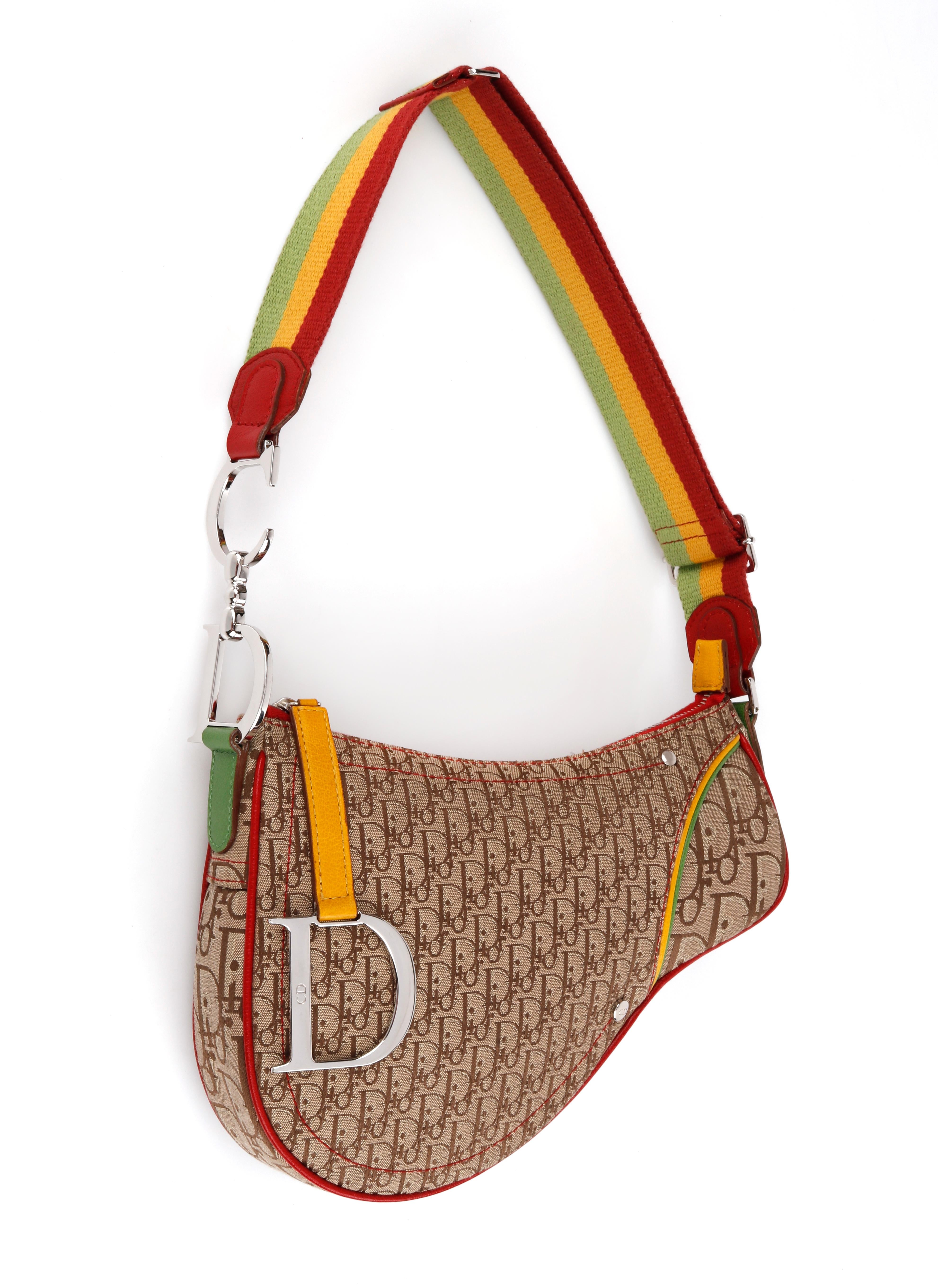 CHRISTIAN DIOR c. 2004 “Rasta” Brown Diorissimo Saddle Shoulder Bag 

Brand / Manufacturer: Christian Dior
Manufacturer Style Name: Saddle Bag
Style: Shoulder Bag  
Color(s): Shades of brown, tan, red, yellow and green. 
Lined: Yes
Unmarked Fabric