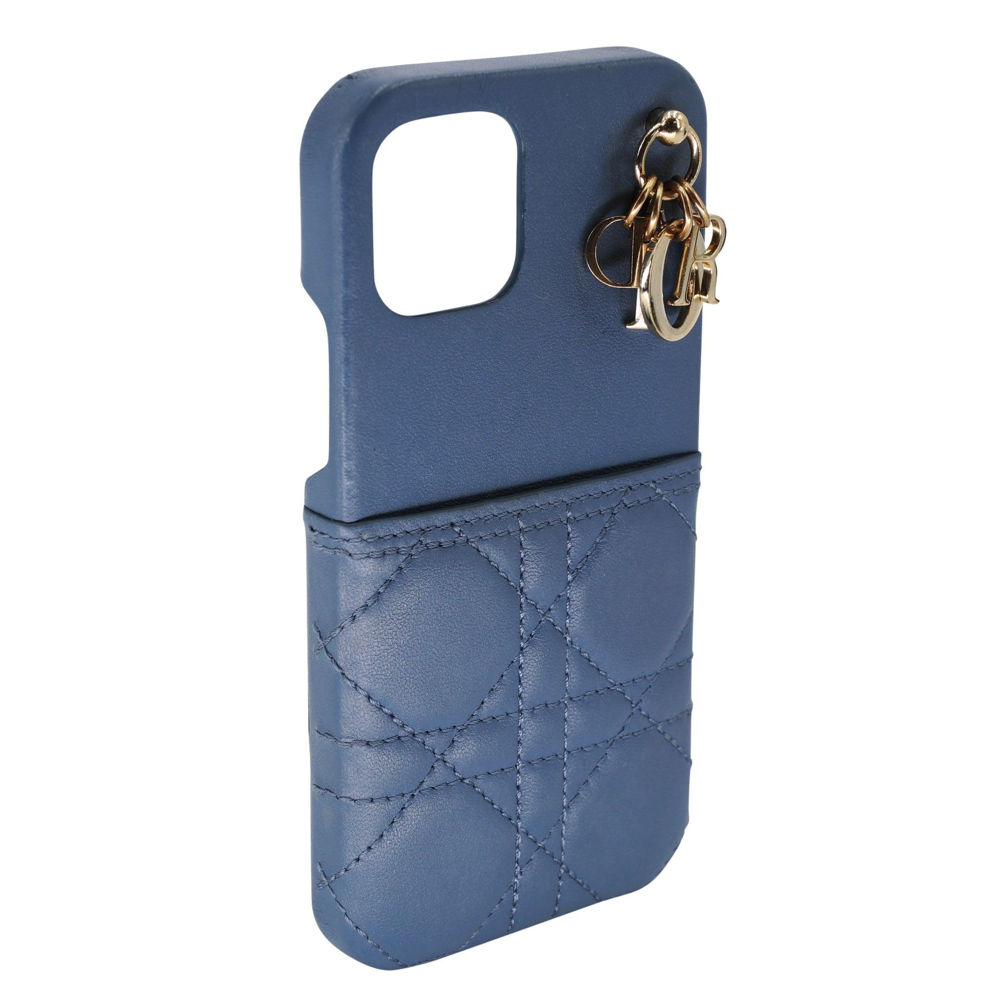 This splendid Lady Dior iPhone 12 case from the House of Dior is not only visually appealing but also very functional and durable. It has been crafted from sky blue Cannage leather and styled with the signature gold-toned 'DIOR' letter charms,