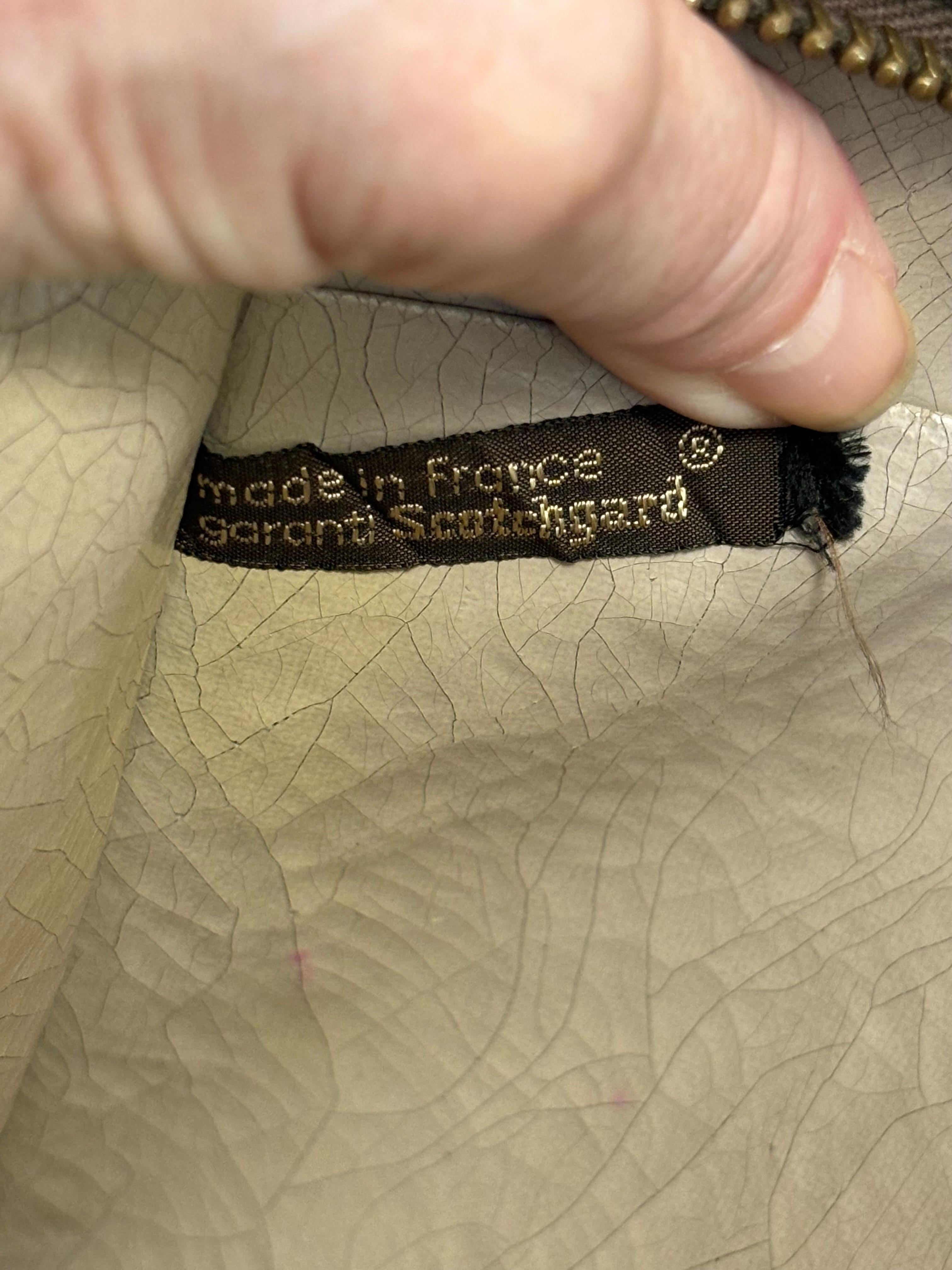 Pochette Christian Dior en toile et cuir avec motif de toupie en Brown/Beige en vente 2