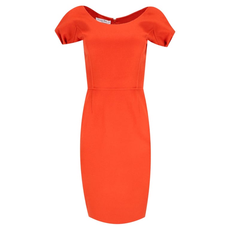 christian dior orange dress Carolina Sjostrand in a sculptural orange cut out dress backstage at Christian Dior Haute Couture SS15. See more here: http://www.dazeddigital.com/fashion/article/23404/1/christian-dior -haute-couture-ss15
