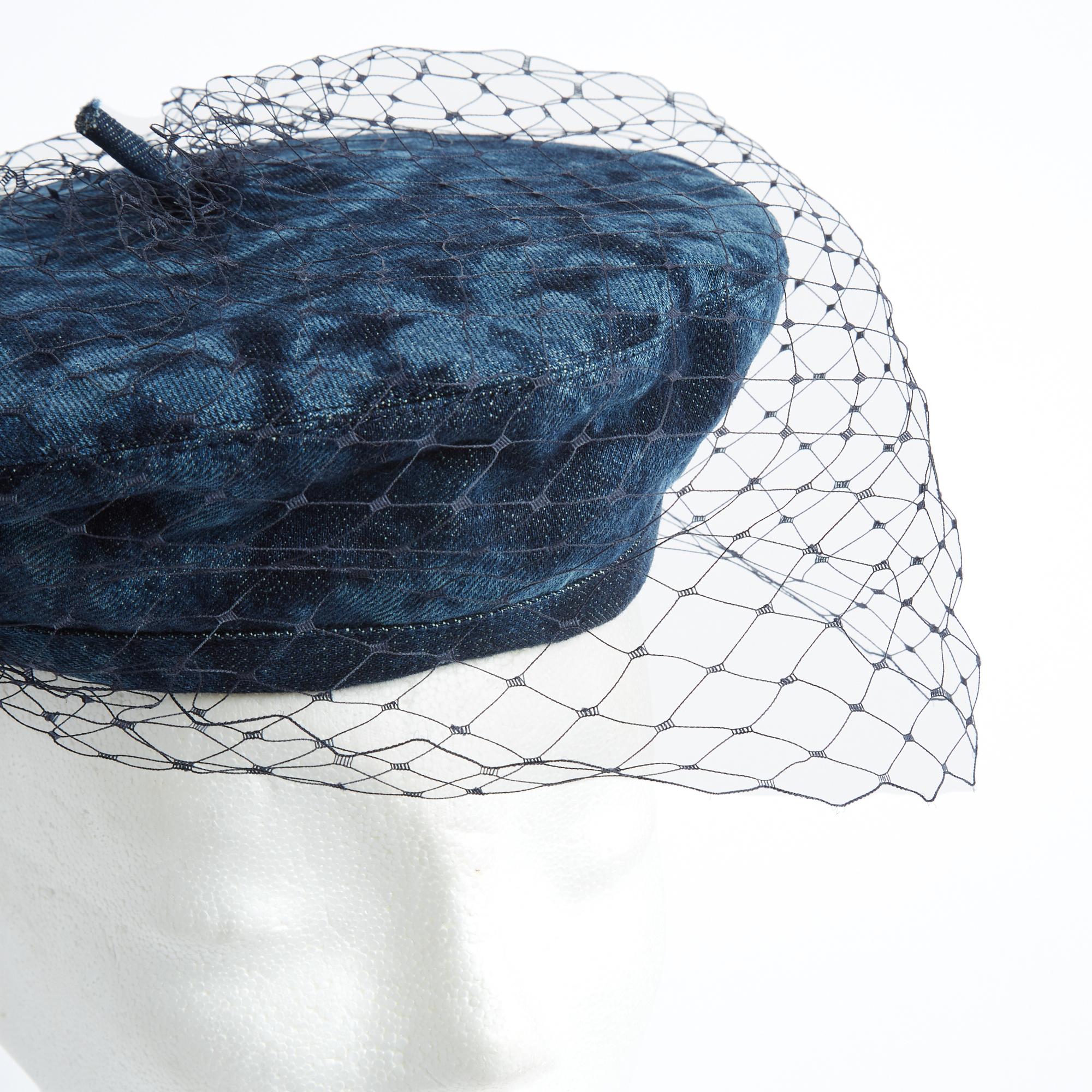 Dior beret hat in blue denim with KaleiDiorscope print, decorated with a matching veil held by a Duir logo in aged gold metal, interior in black canvas with logo, size 57. The hat has never been worn and it has its original labels, delightful for