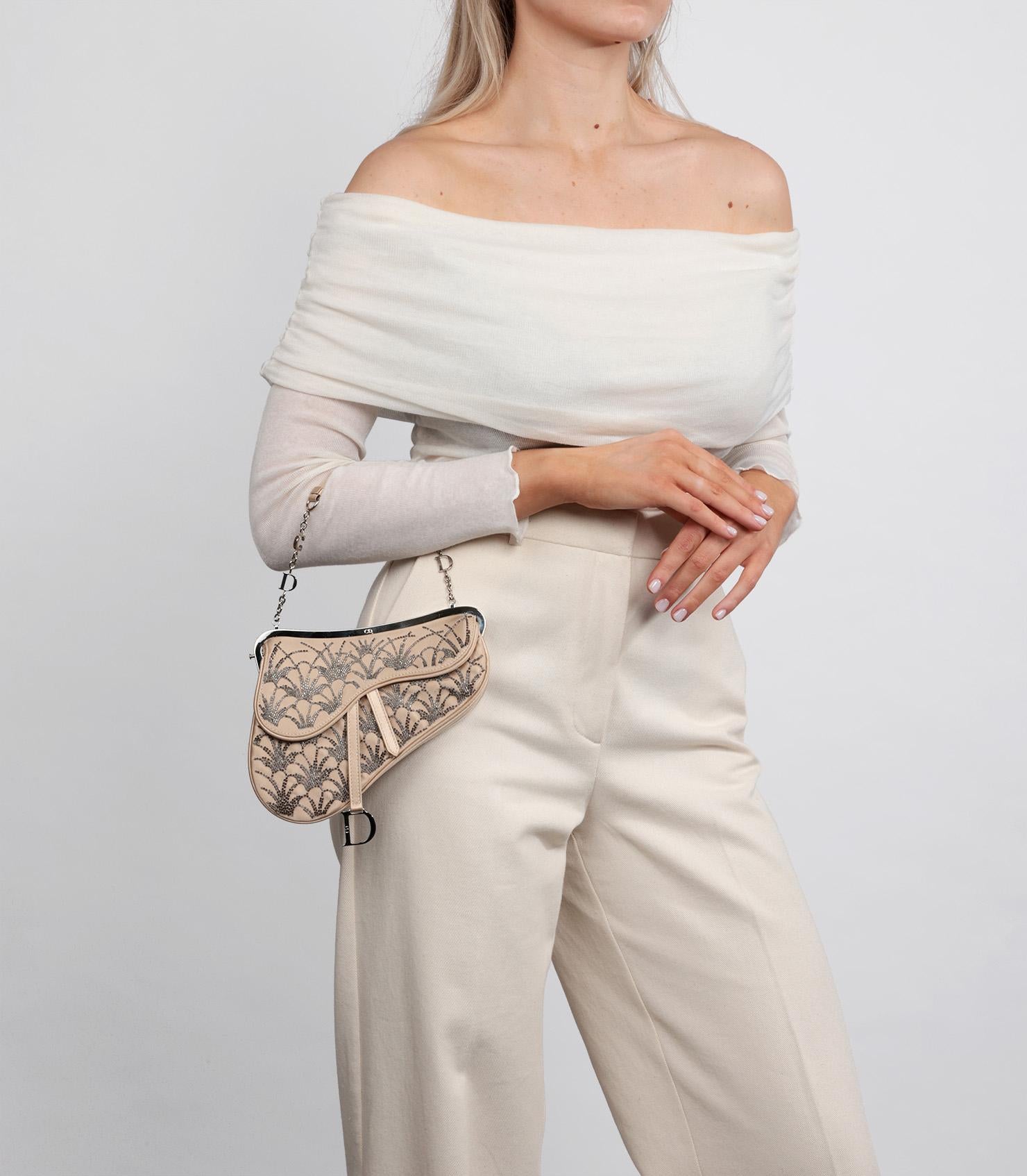 Brand: Christian Dior
Model: Mini Saddle Bag
Product Type: Top Handle
Serial Number: 09********
Age: Circa 2005
Accompanied By: Christian Dior Dust Bag, Mirror
Colour: Champagne Gold, Grey
Hardware: Silver
Material(s): Satin
Authenticity Details: