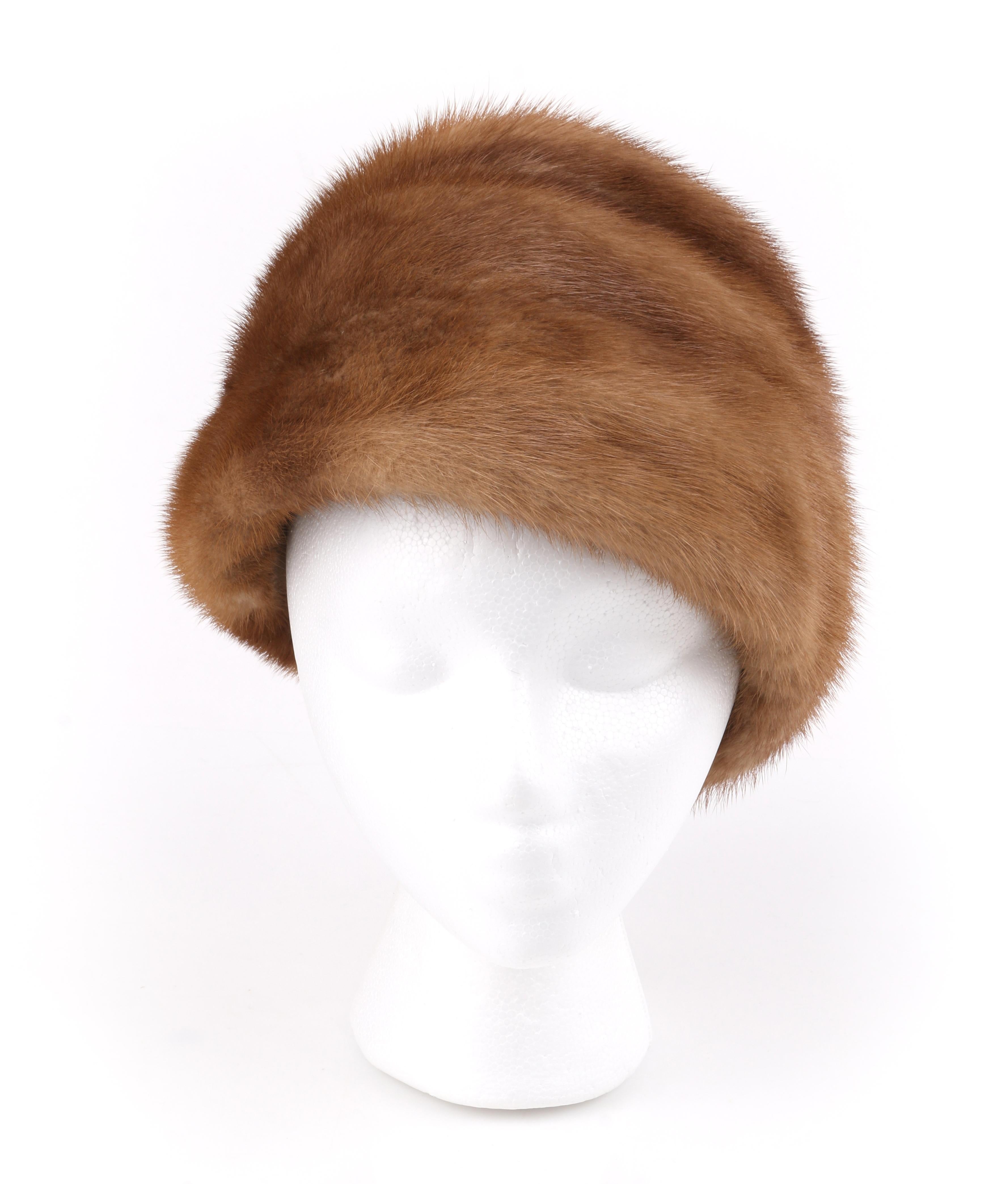 CHRISTIAN DIOR Chapeaux c.1960’s Marc Bohan Brown Mink Fur Tiered Cossack Hat
 
Circa: 1960’s
Label(s): Christian Dior / Chapeaux / Paris - New York
Designer: Marc Bohan
Style: Cossack Hat
Color(s): Brown
Lined: Yes 
Unmarked Fabric Content: Mink
